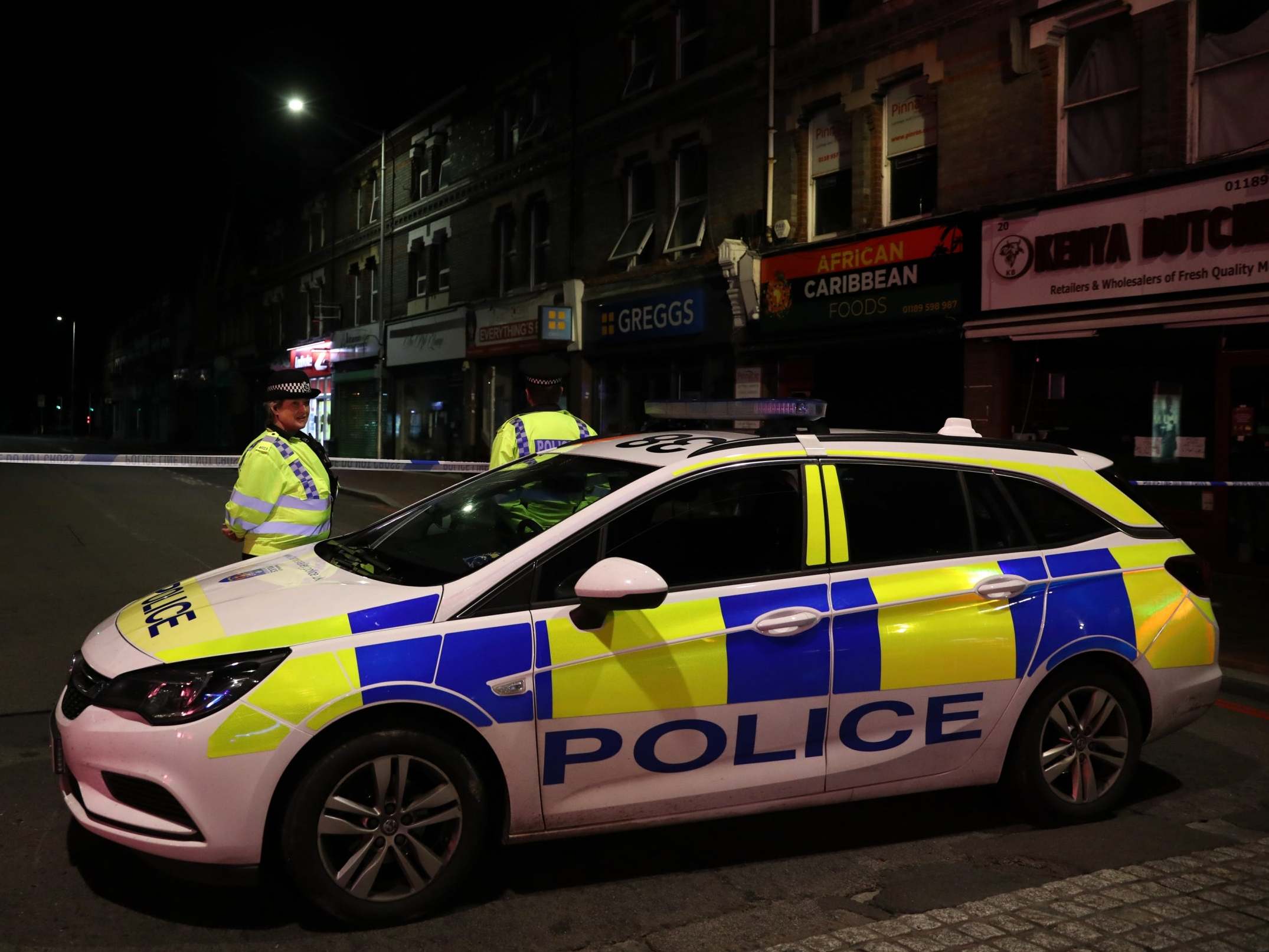 A police cordon near the scene where three people have died and three more were seriously injured following stabbings in Forbury Gardens, Reading, on 21 June 2020