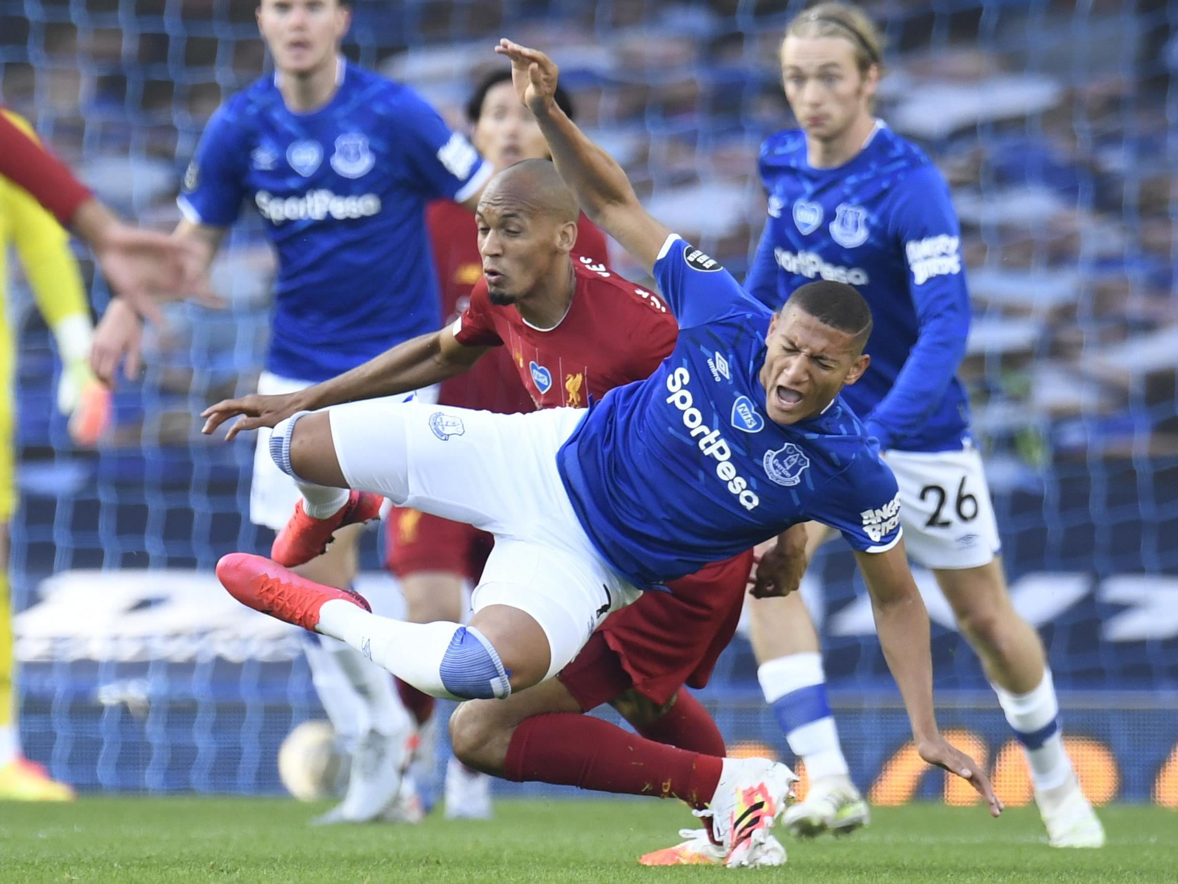 Liverpool’s Fabinho in action with Everton’s Richarlison (REUTERS)