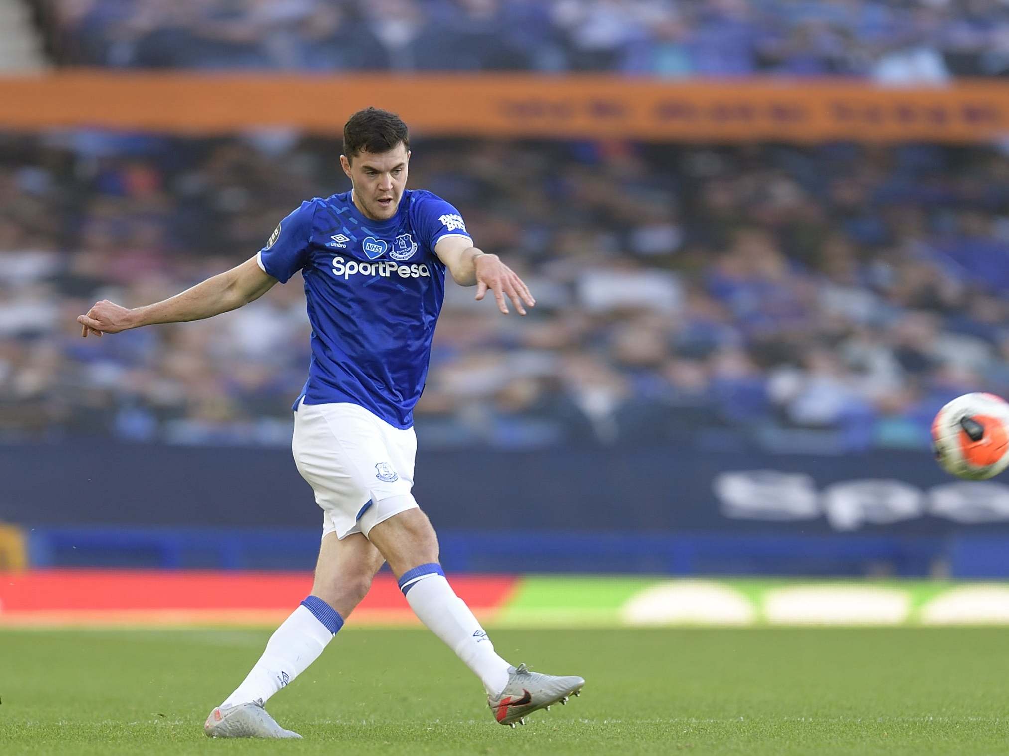 Michael Keane in action against Liverpool
