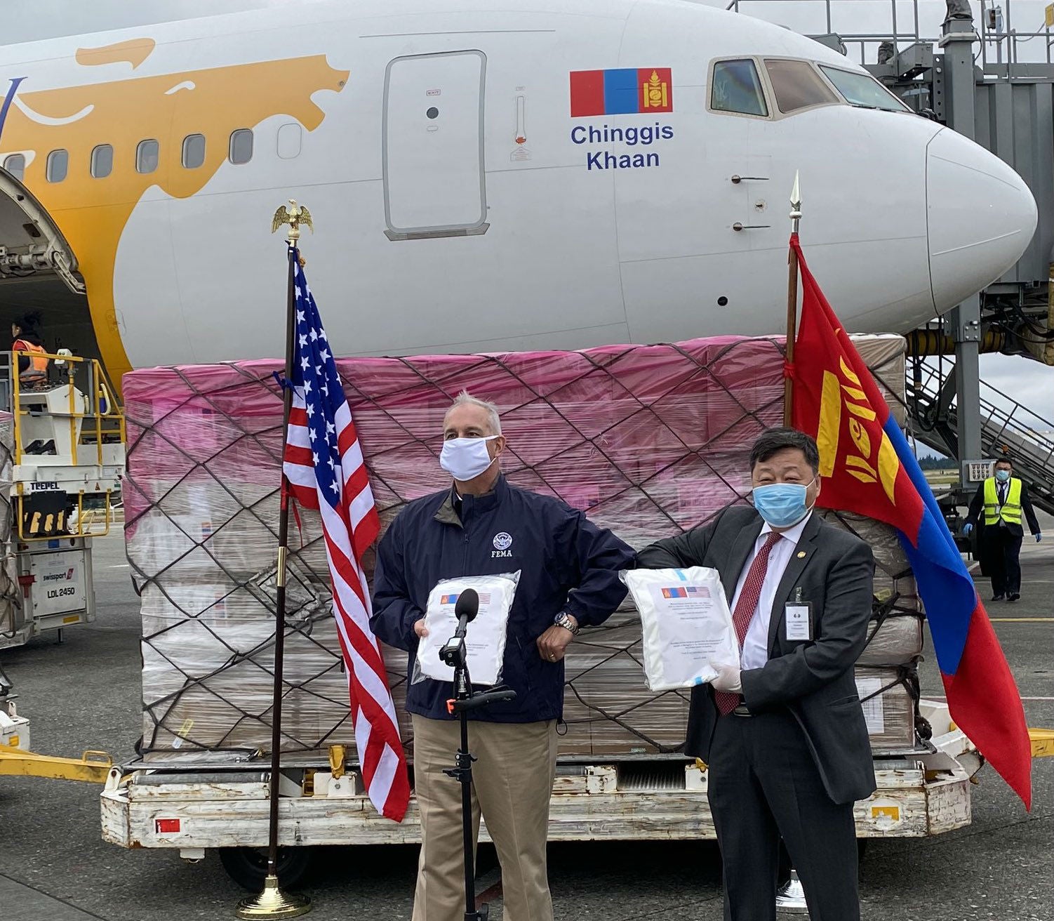 FEMA official Michael O’Hare accepts donation from Mongolian ambassador Yondon Otgonbayar