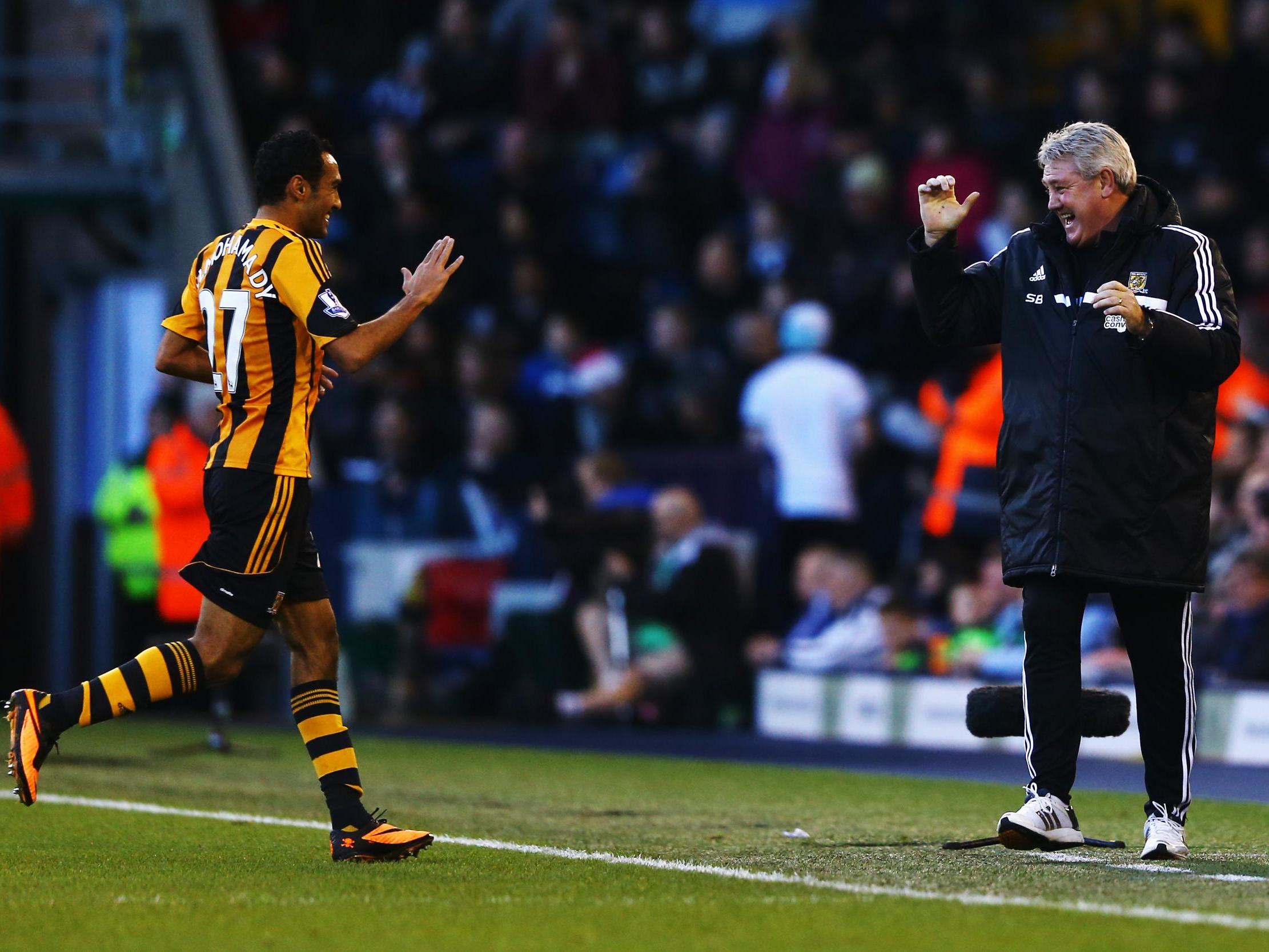 Elmohamady runs to celebrate with Bruce at Hull