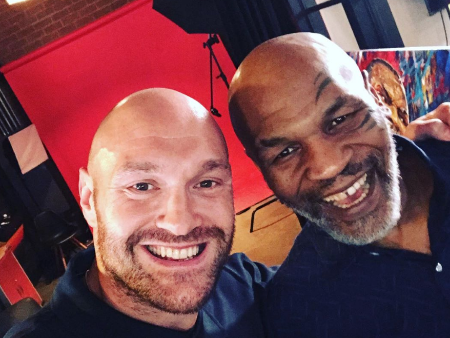 Tyson Fury and Mike Tyson pose for a picture