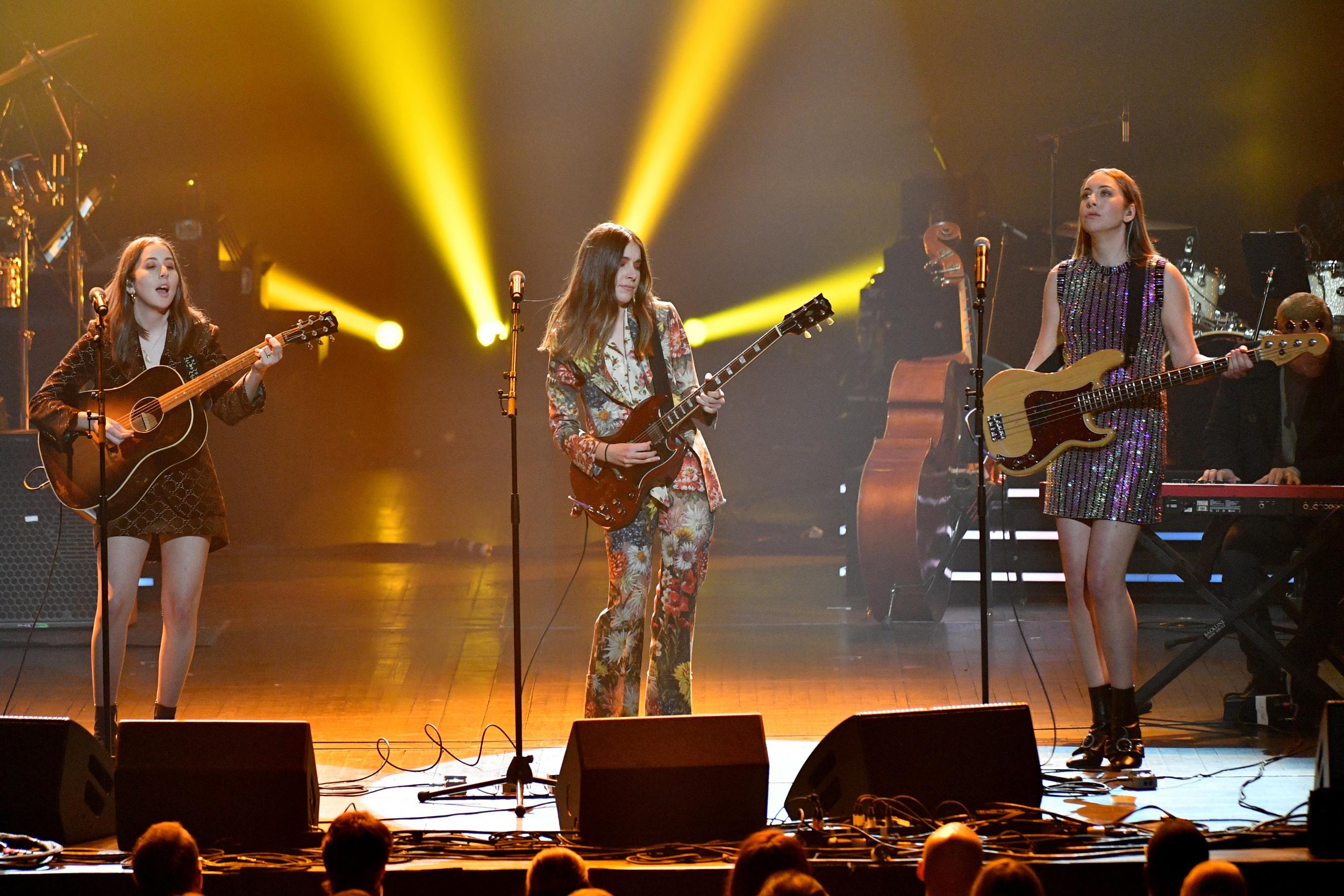 Alana Haim, Danielle Haim, and Este Haim perform onstage at Radio City Music Hall, New York, in honour of Fleetwood Mac. 26 January 2018