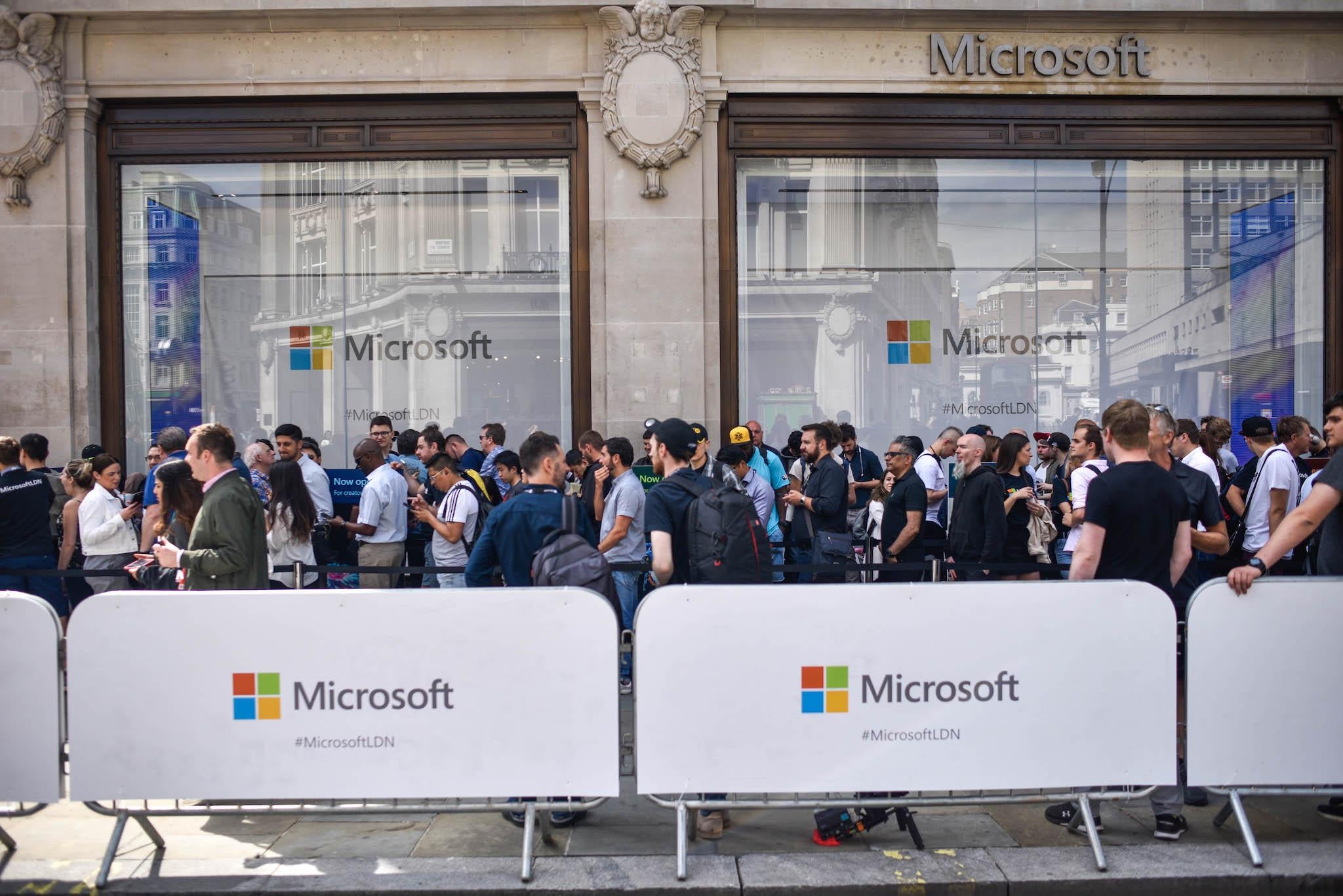 People queue outside the Microsoft store prior to opening on July 11, 2019 in London, England