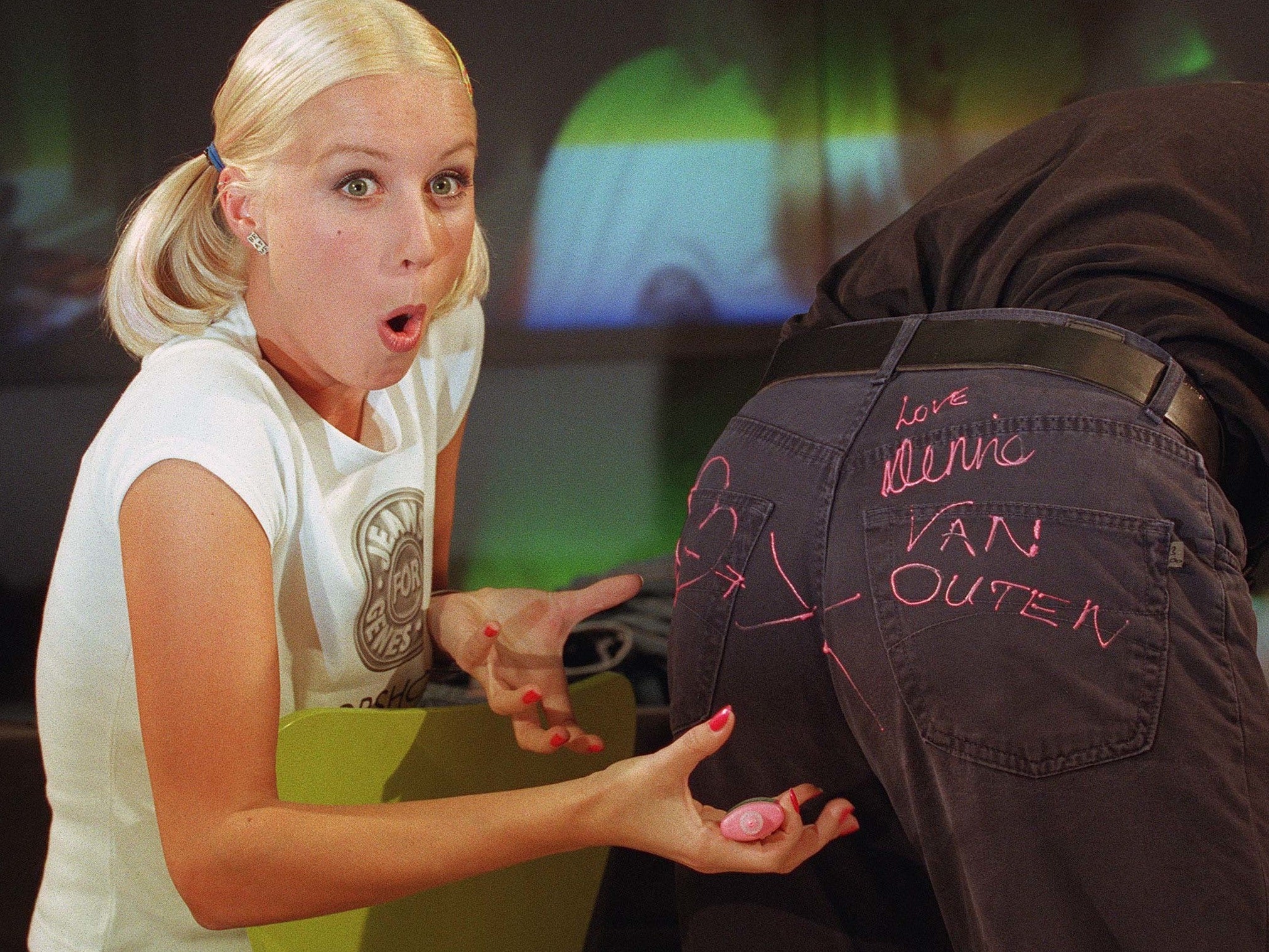 &#13;
Denise van Outen jokes around while signing a pair of jeans at Topshop in Oxford Circus in 1998 &#13;