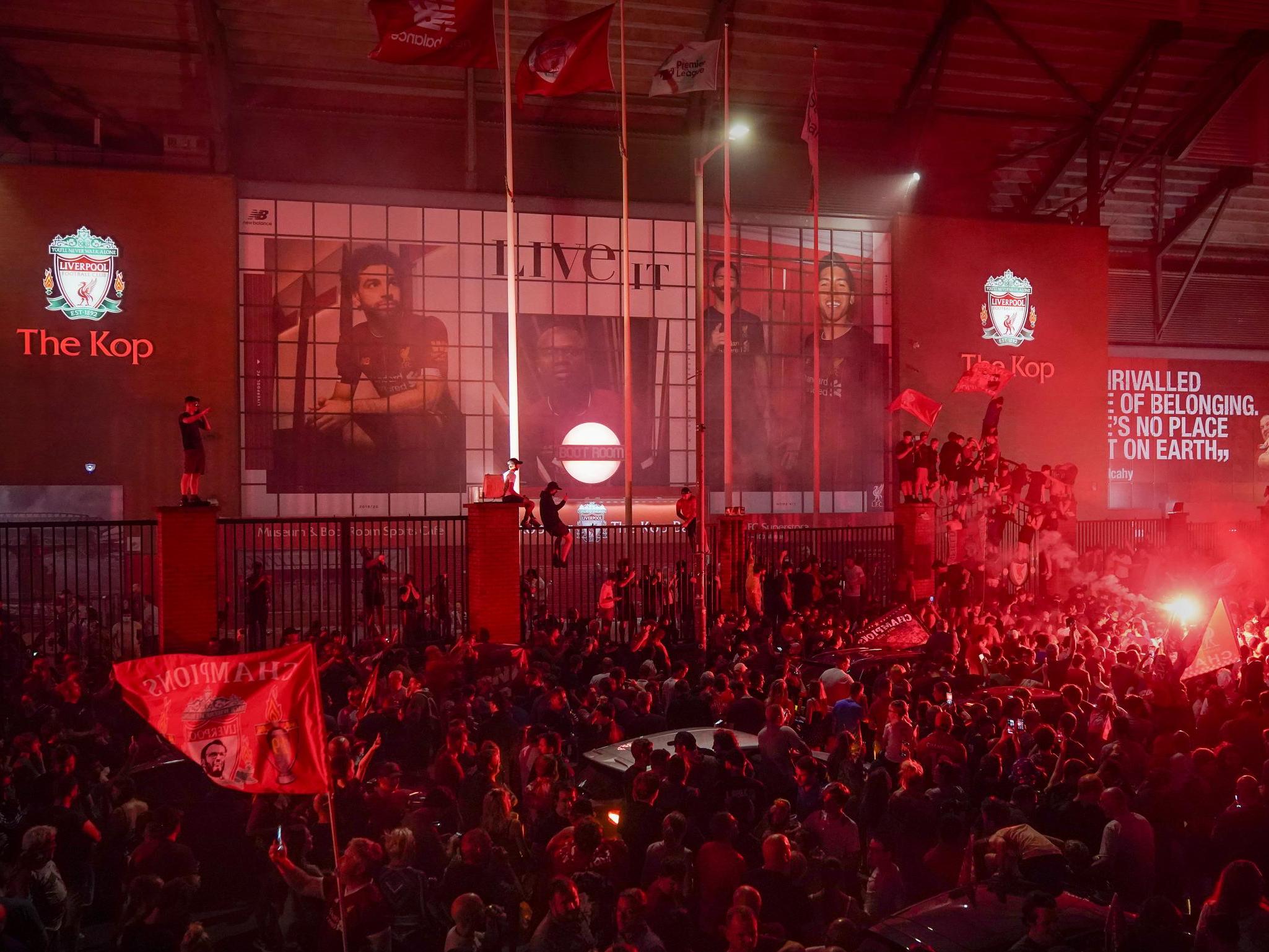 Liverpool fans celebrate winning the Premier League title