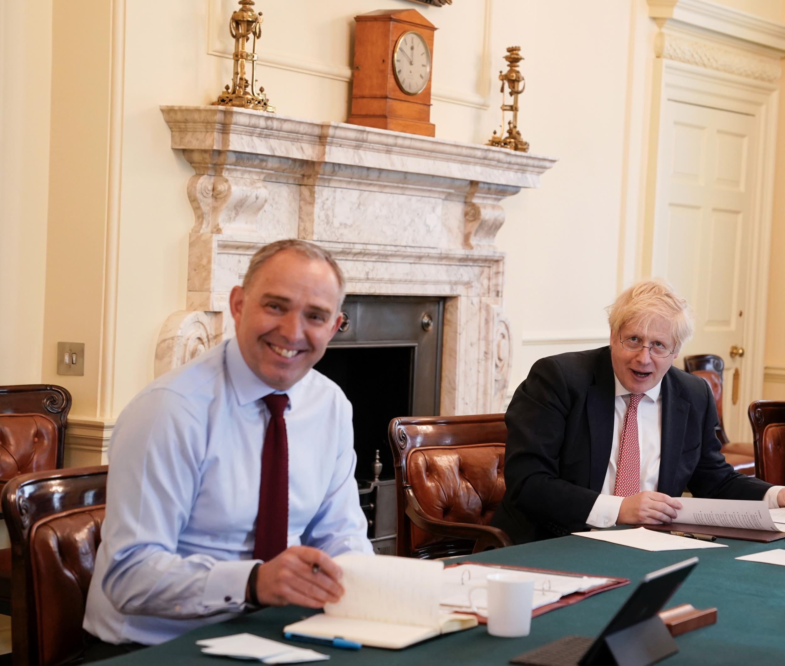 Sedwill sitting next to Boris Johnson as the PM chaired his first digital cabinet meeting after being admitted to hospital with Covid-19