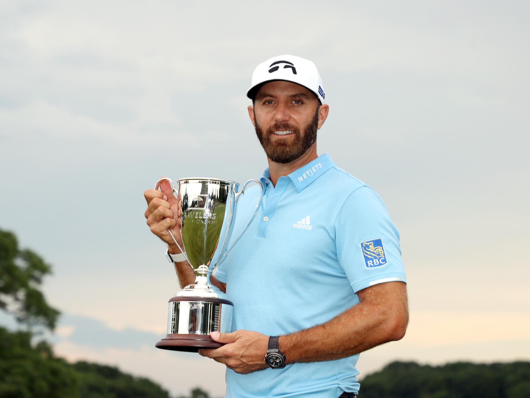 Johnson celebrates winning the Travelers Championship