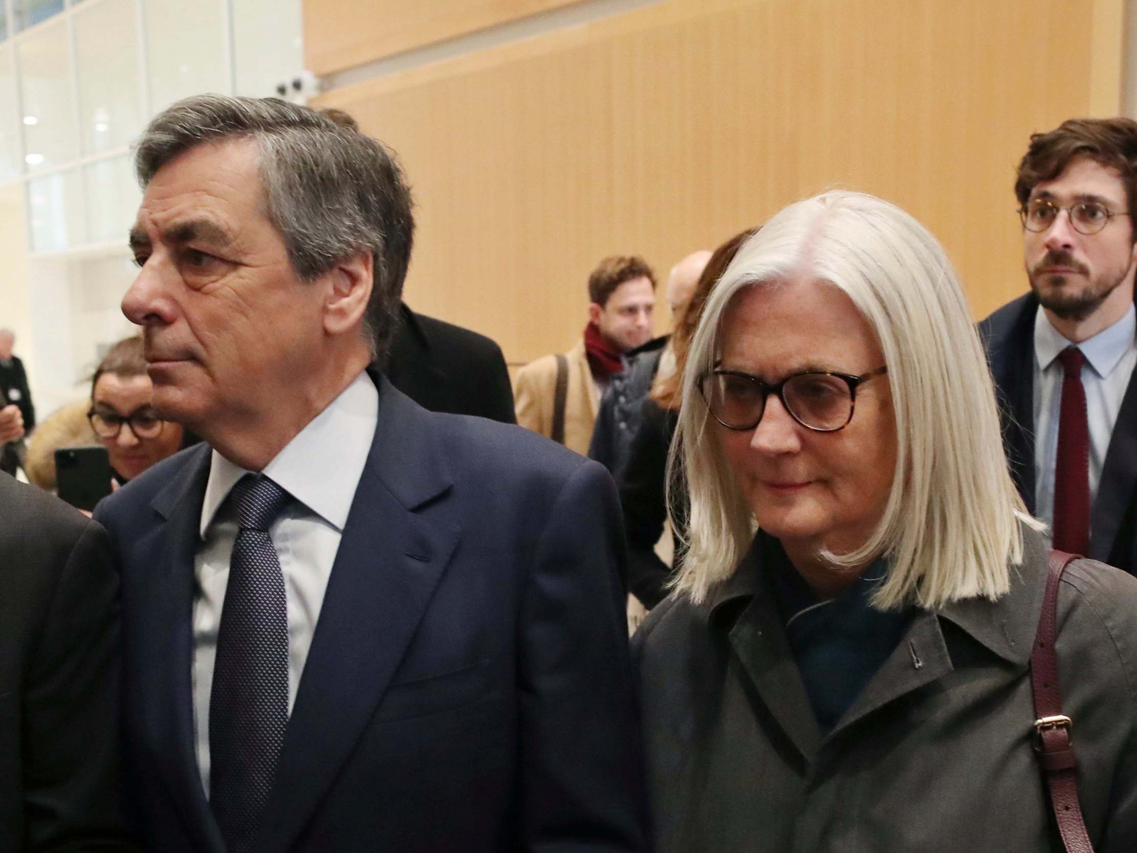 France’s former Prime Minister Francois Fillon, left, and his wife Penelope, arrive at the Paris courthouse