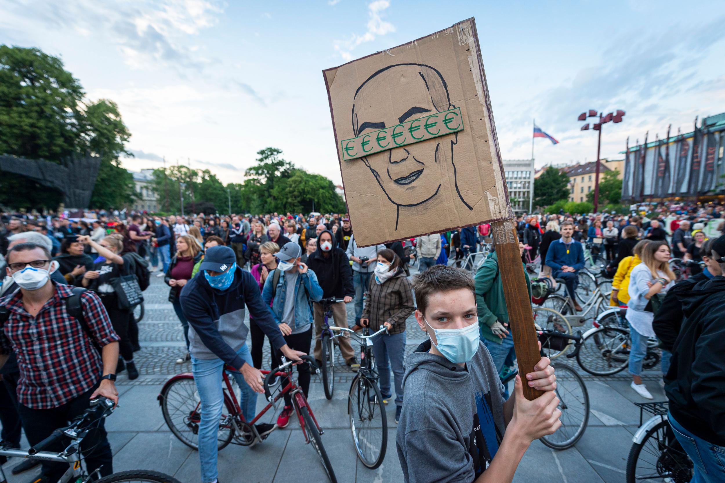 Slovenians protest in the capital Ljubljana against the government they accuse of corruption and of using coronavirus to restrict freedoms