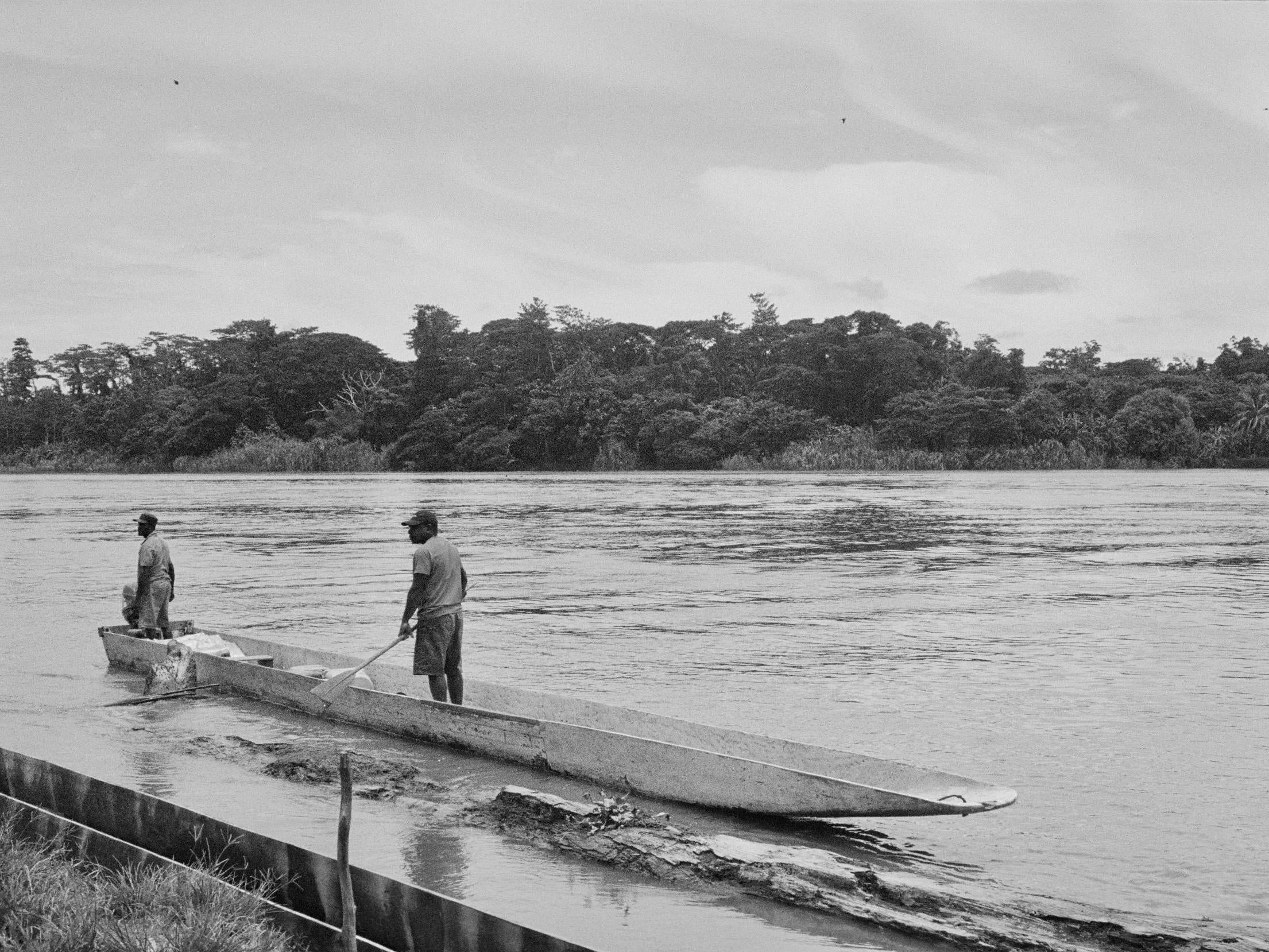 Manu’s cousin Collis guides the canoe. He prefers the rhythms of village life. ‘The village has more freedom – you are your own boss’