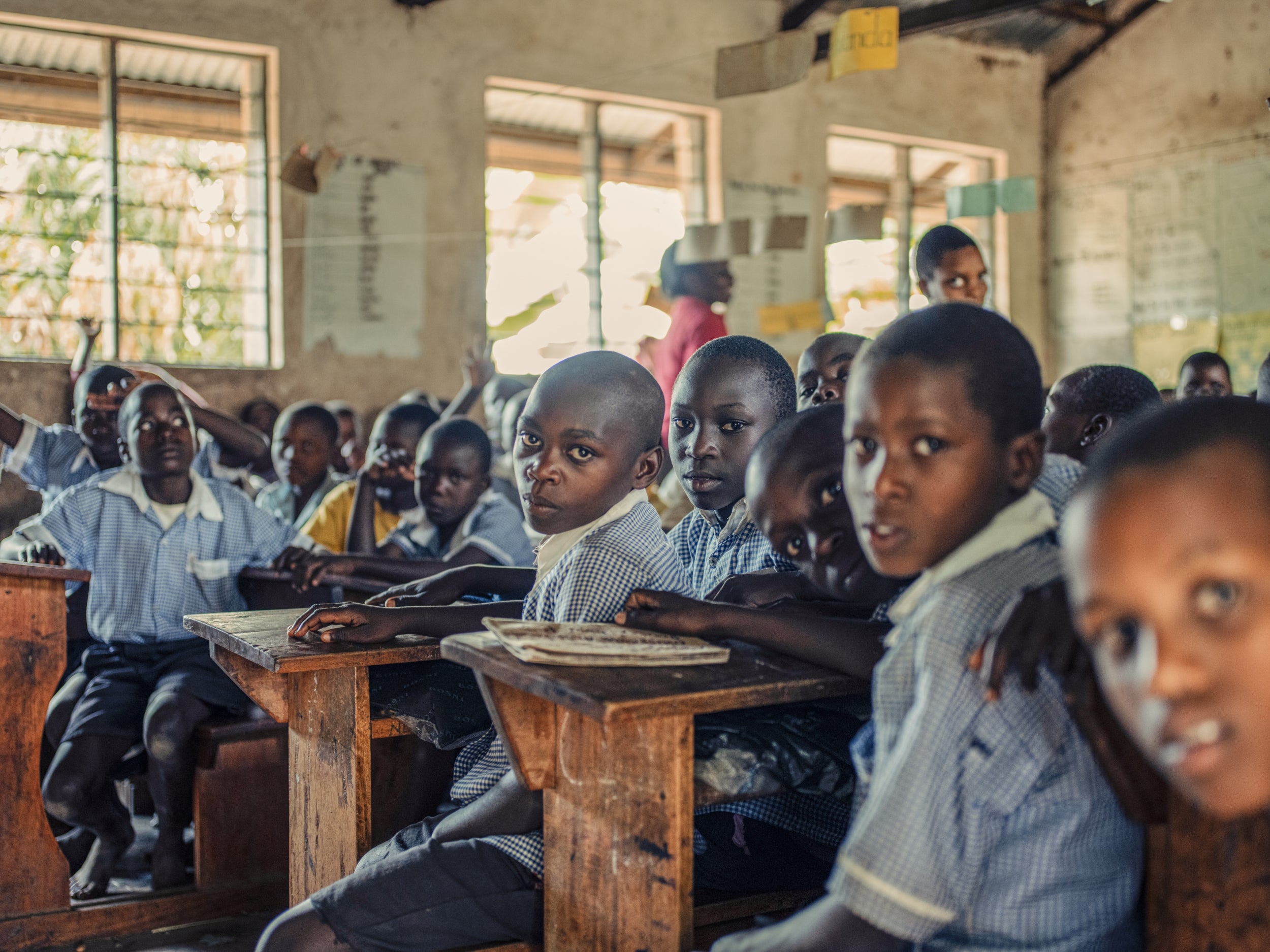 Social distancing measures present additional challenges for already-crowded classrooms in Uganda