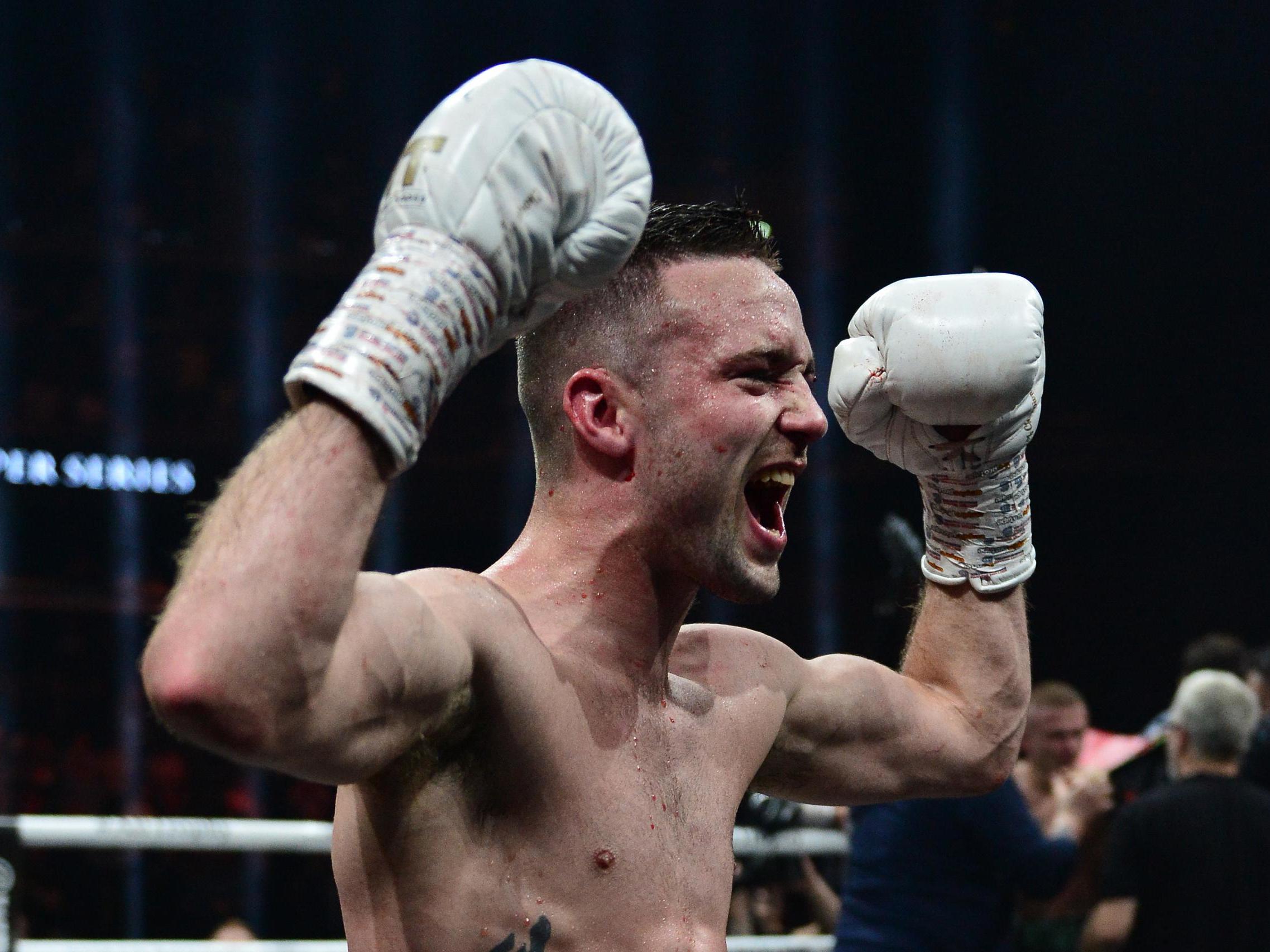 Taylor celebrates beating Ivan Baranchyk