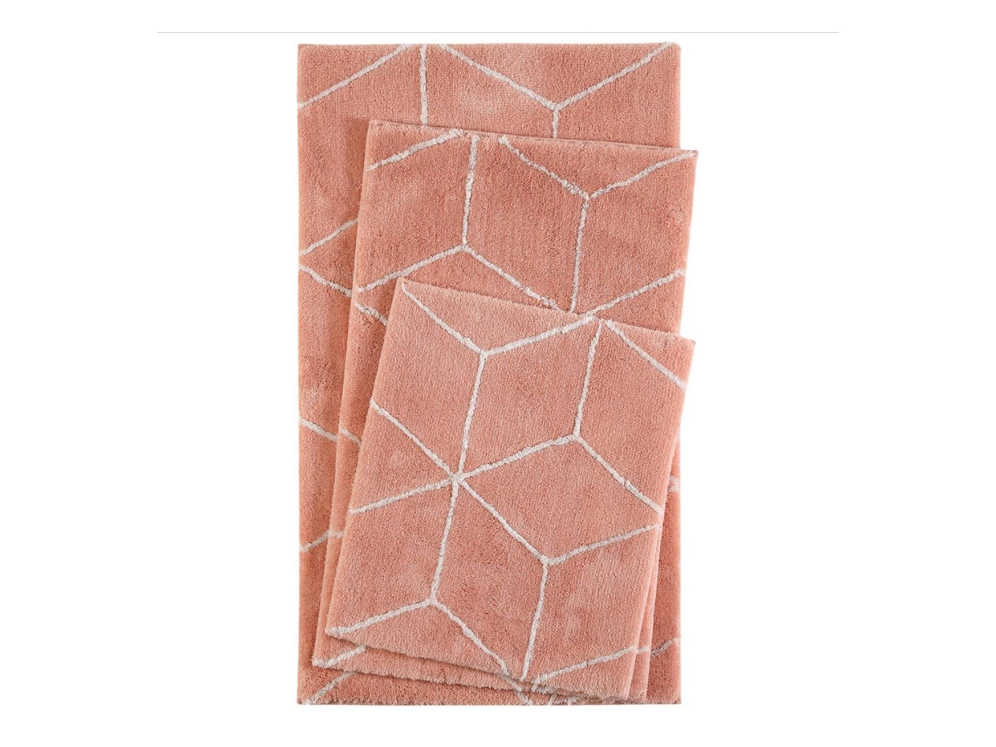 A plush, soft bathmat is an easy update to a bathroom (The Rug Seller)