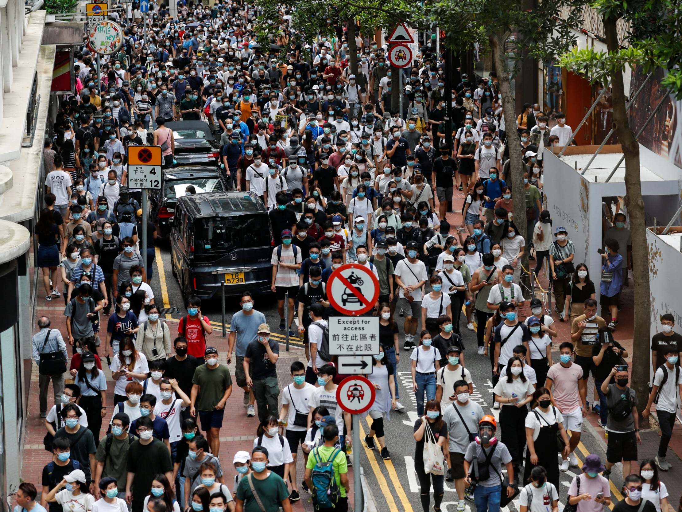 Anti-national security law protesters march at the anniversary of Hong Kong's handover to China from Britain, in Hong Kong, China July 1, 2020.