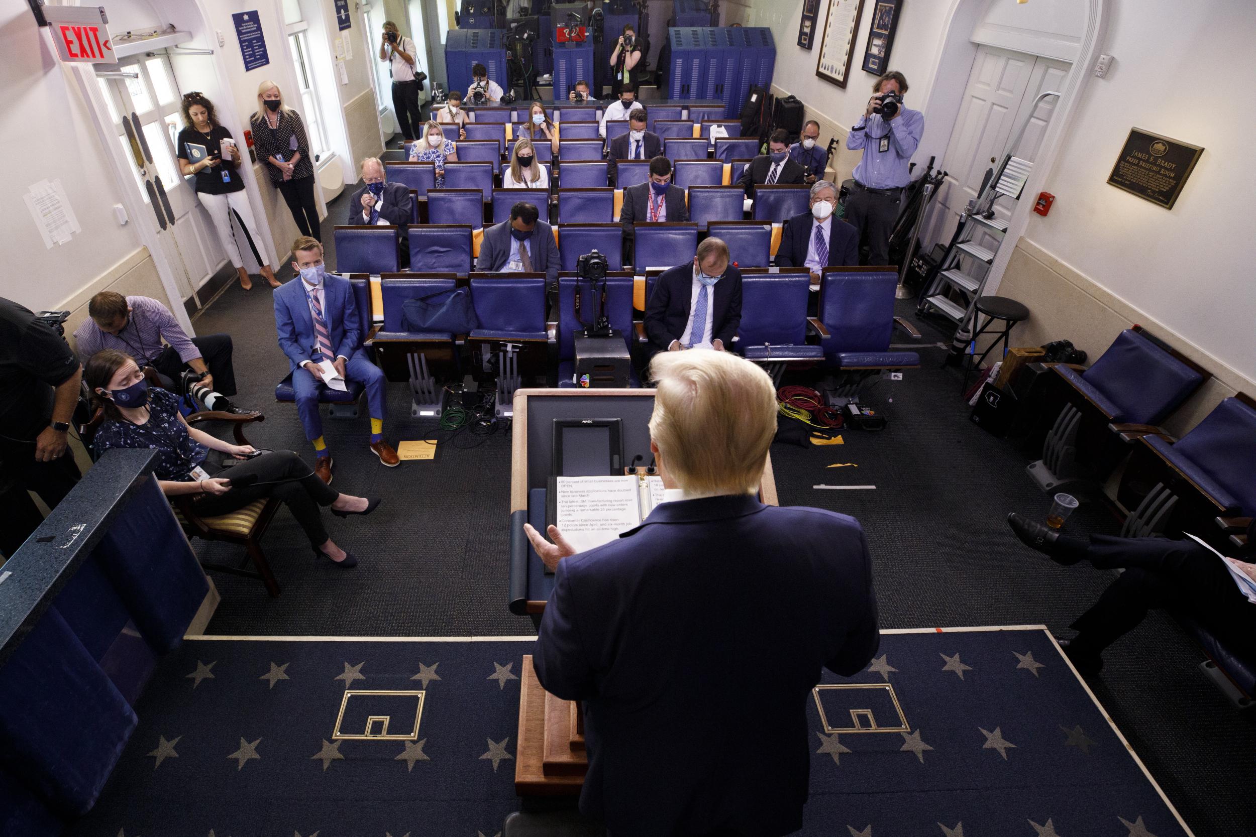 Donald Trump holds a press briefing at the White House