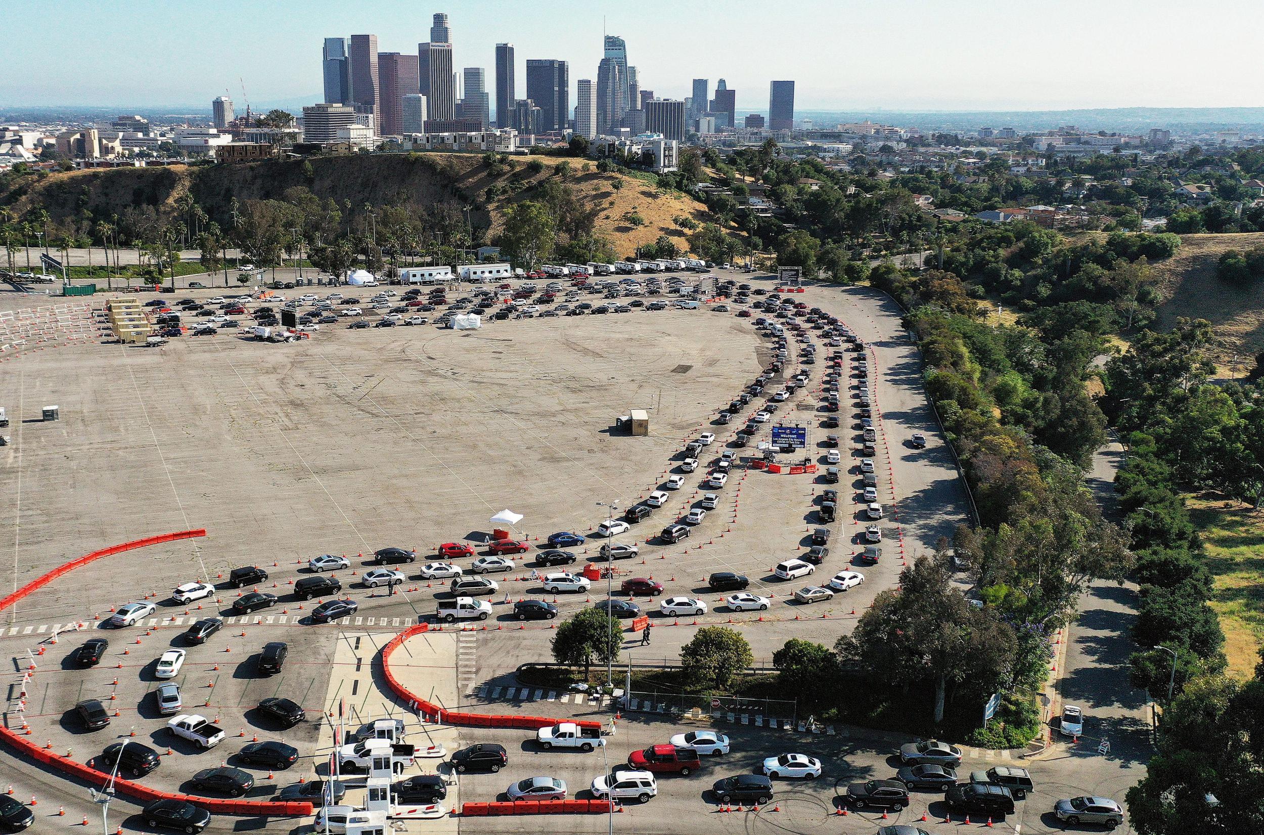 People queue up for Covid testing in LA, which has seen another huge surge in cases (Getty)