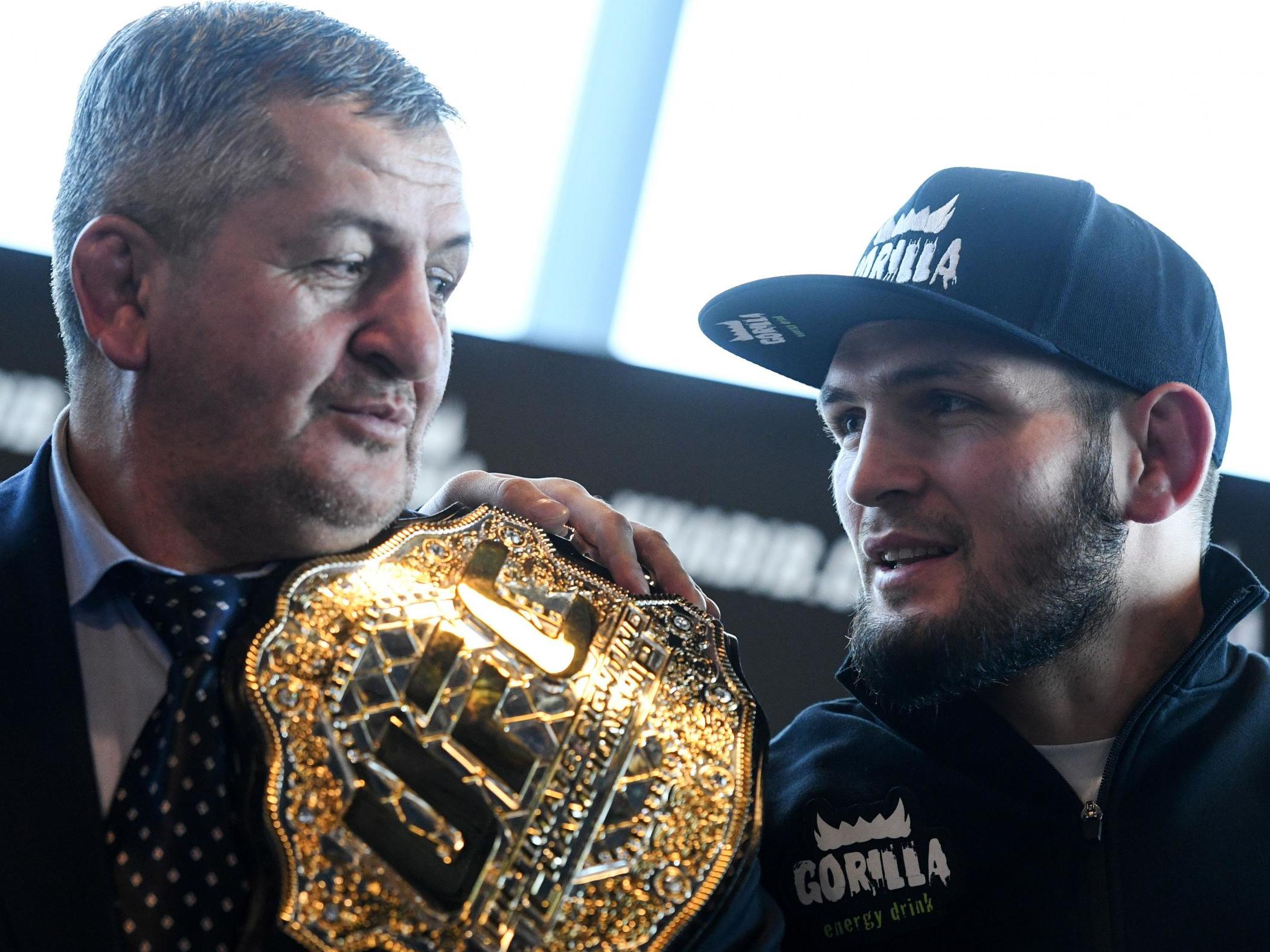 Abdulmanap Nurmagomedov (left) with his son, UFC lightweight champion Khabib Nurmagomedov