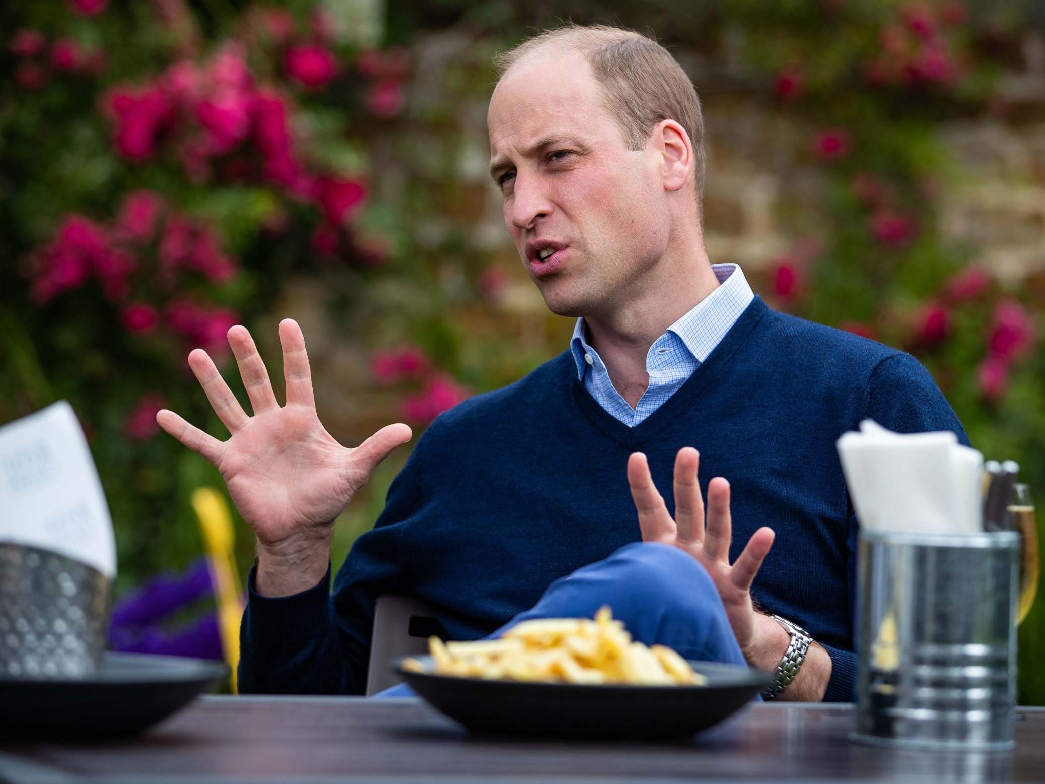 The Duke of Cambridge talks to the landlords and workers at The Rose and Crown pub in Snettisham, Norfolk.