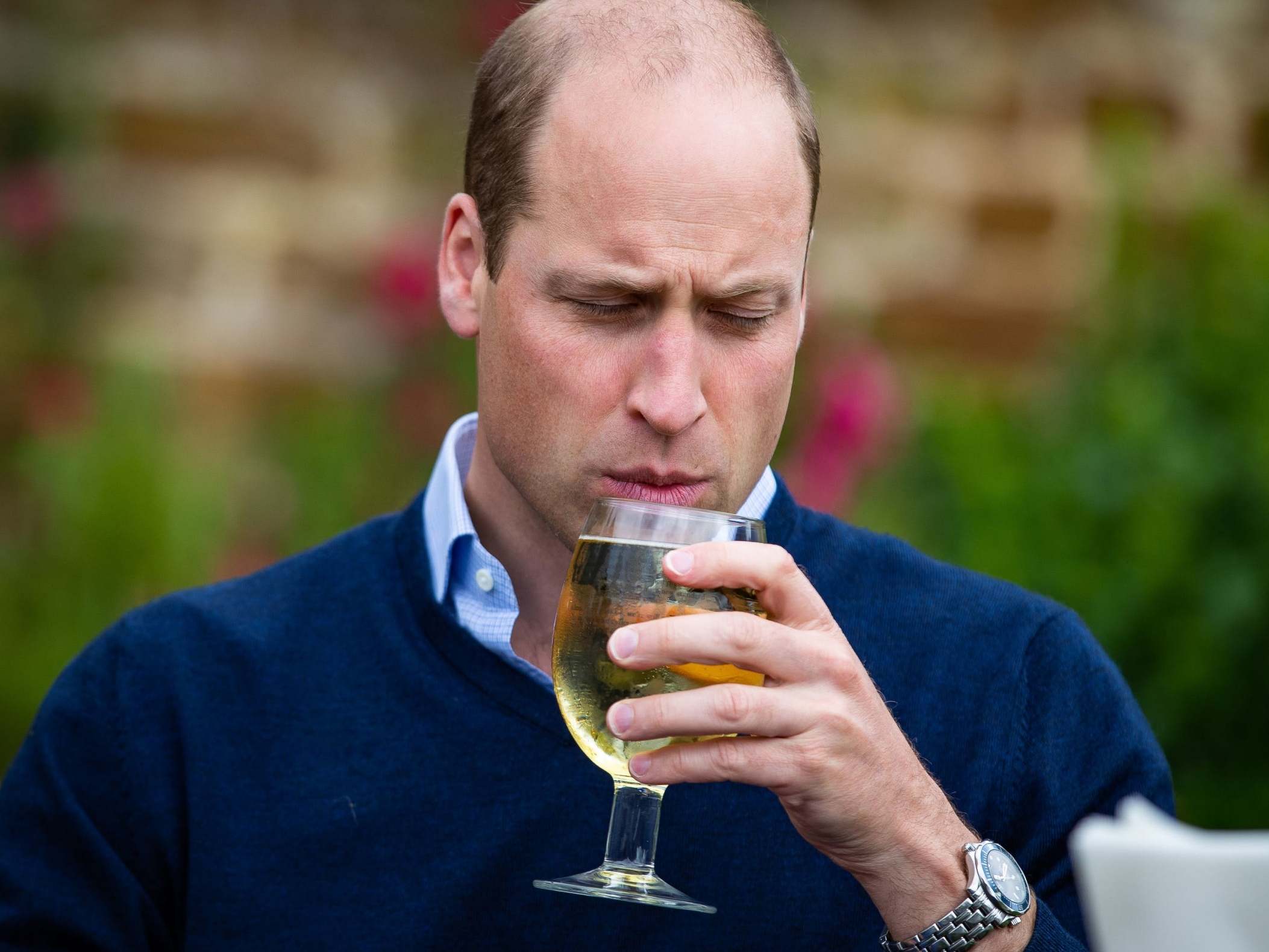 The Duke of Cambridge takes a sip of an Aspalls cider at The Rose and Crown pub in Snettisham, Norfolk.