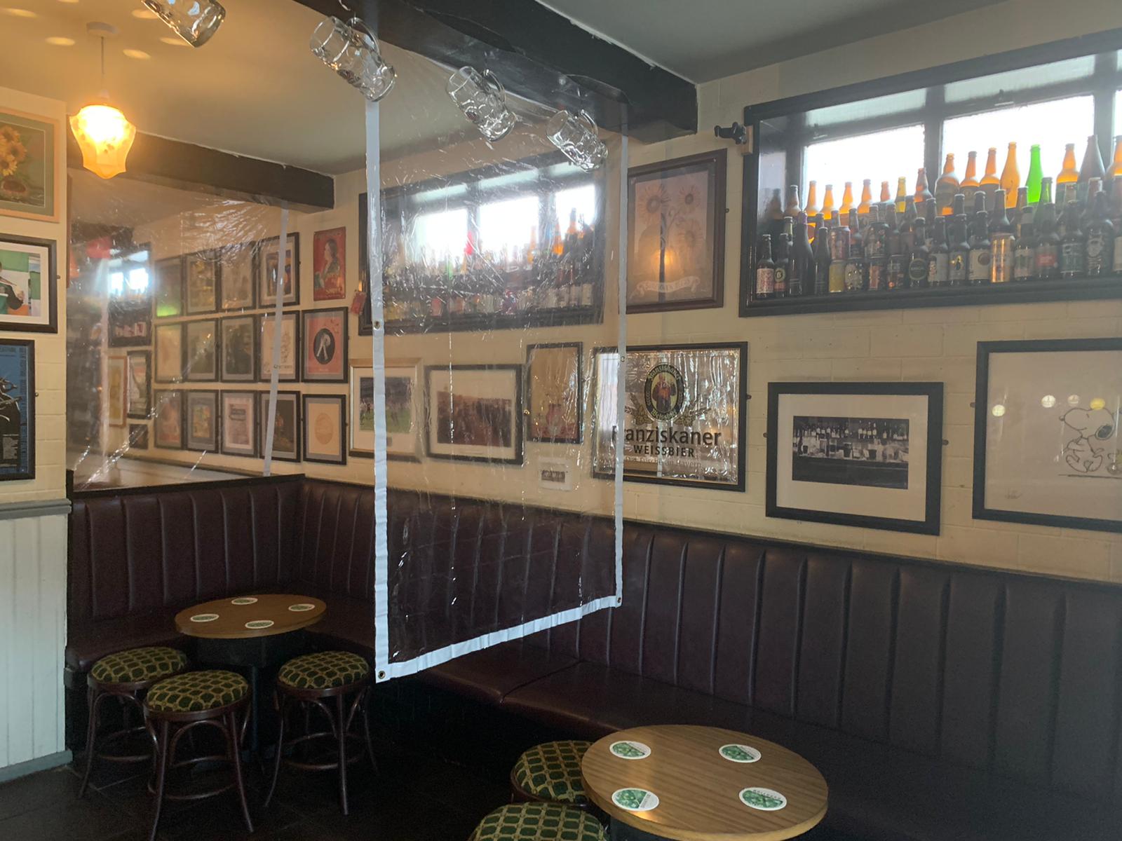 The Sunflower pub in Belfast is fitted out with plastic screens for social distancing