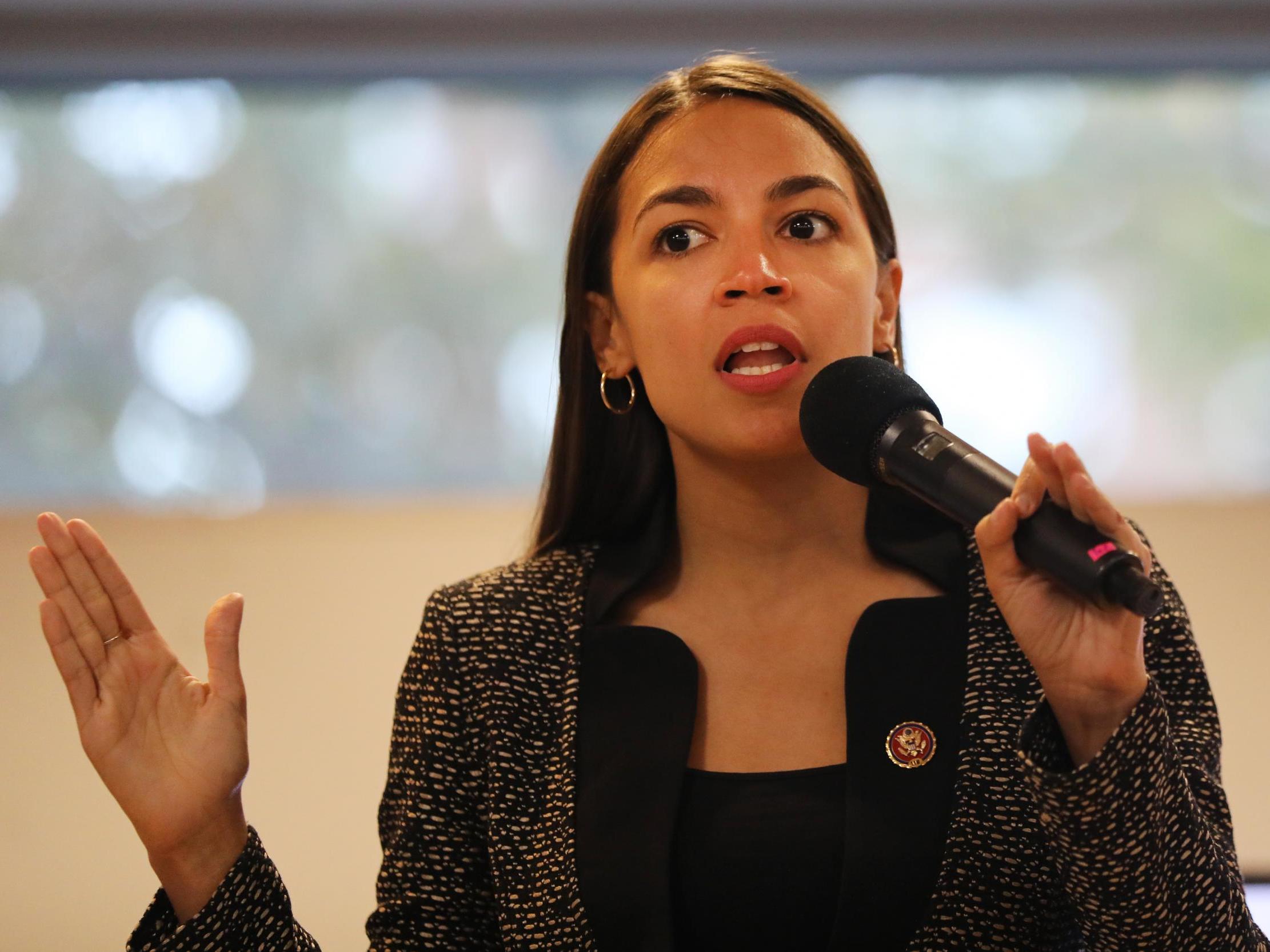 AOC shared a potential slogan for a possible presidential bid in 2024