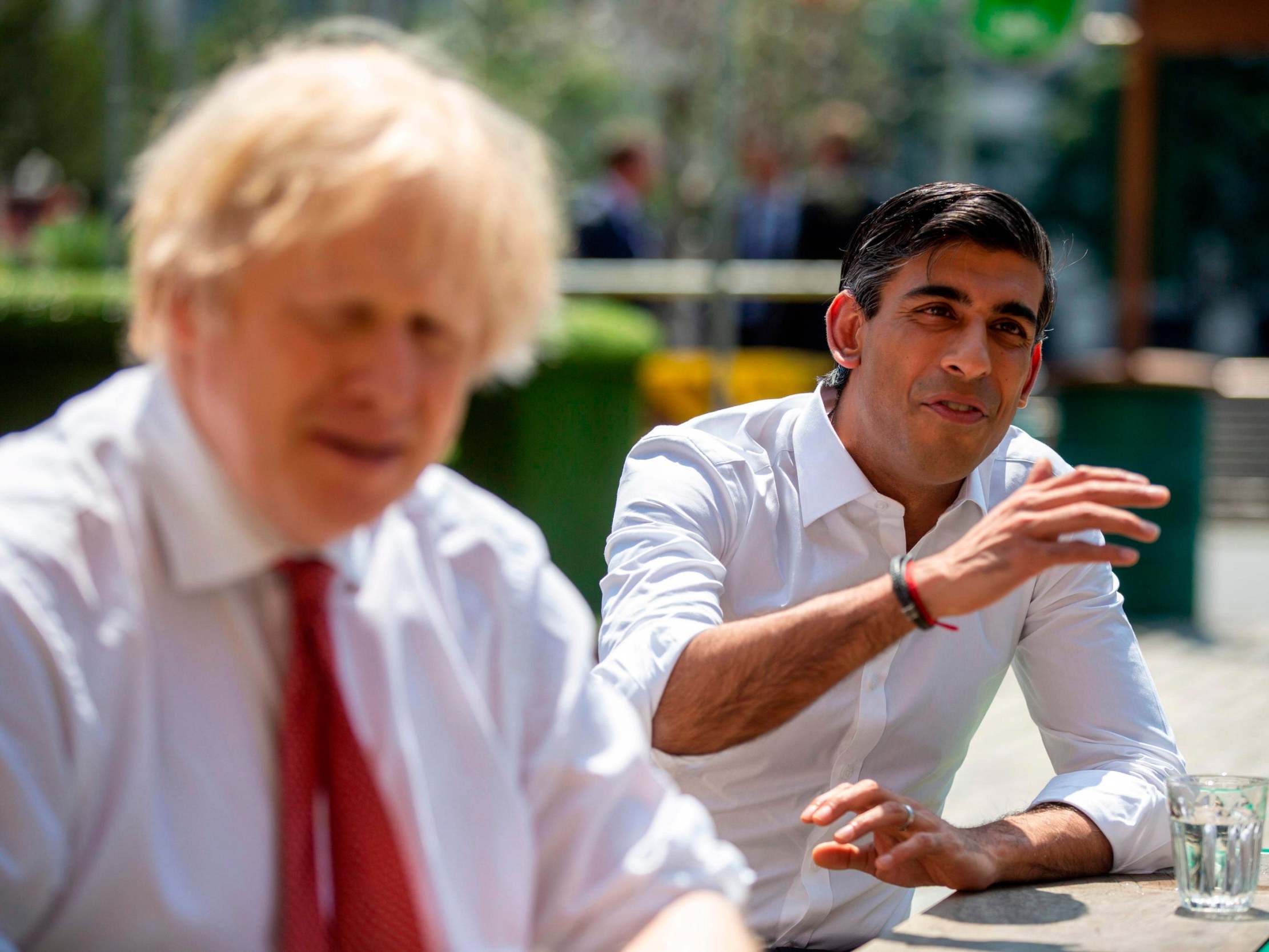 Rishi Sunak, right, visits Pizza Pilgrims restaurant in London with Boris Johnson