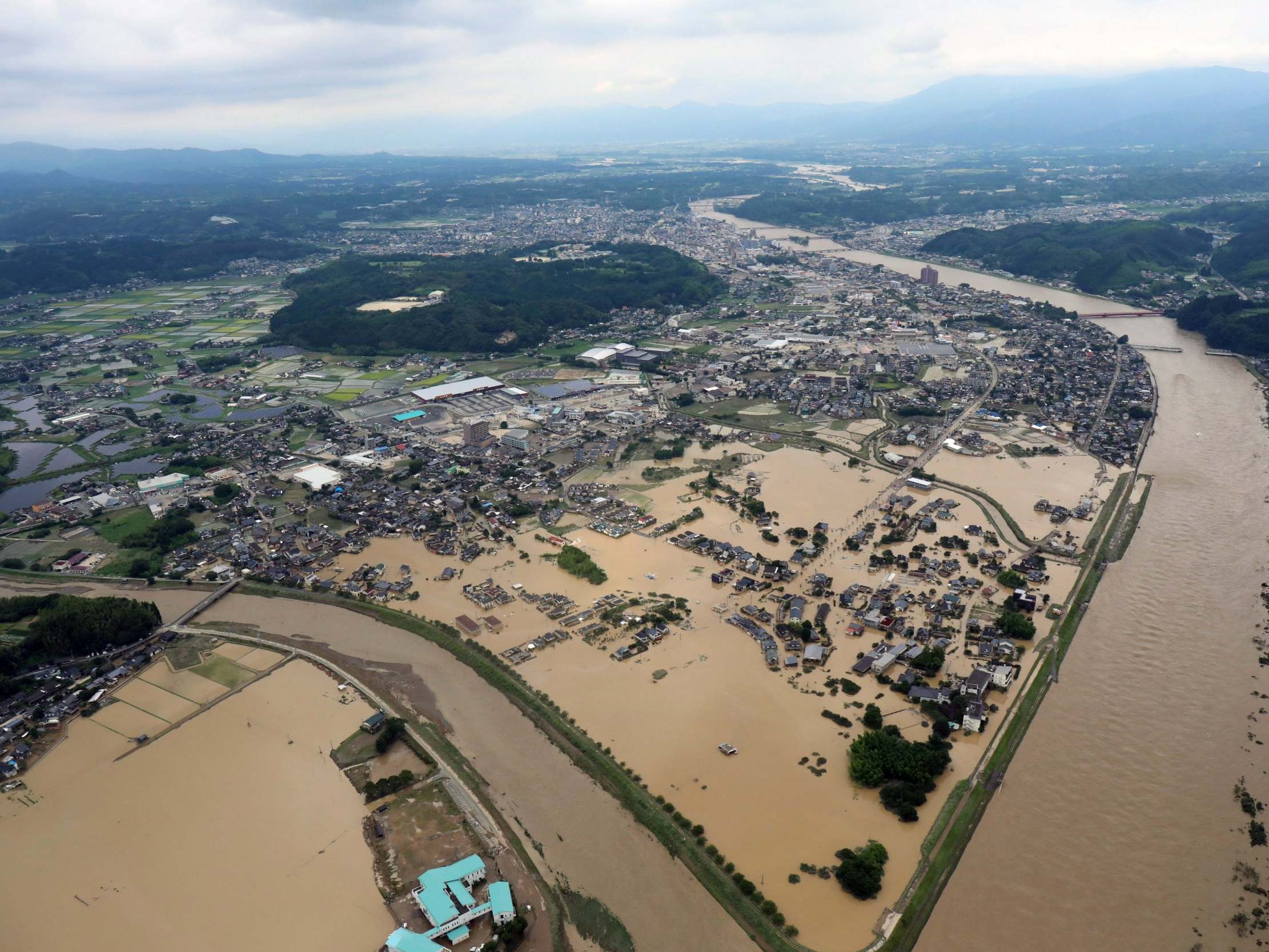 An aerial view of the floods in Hitoyoshi, Kumamoto prefecture, southwestern Japan, 4 July 2020