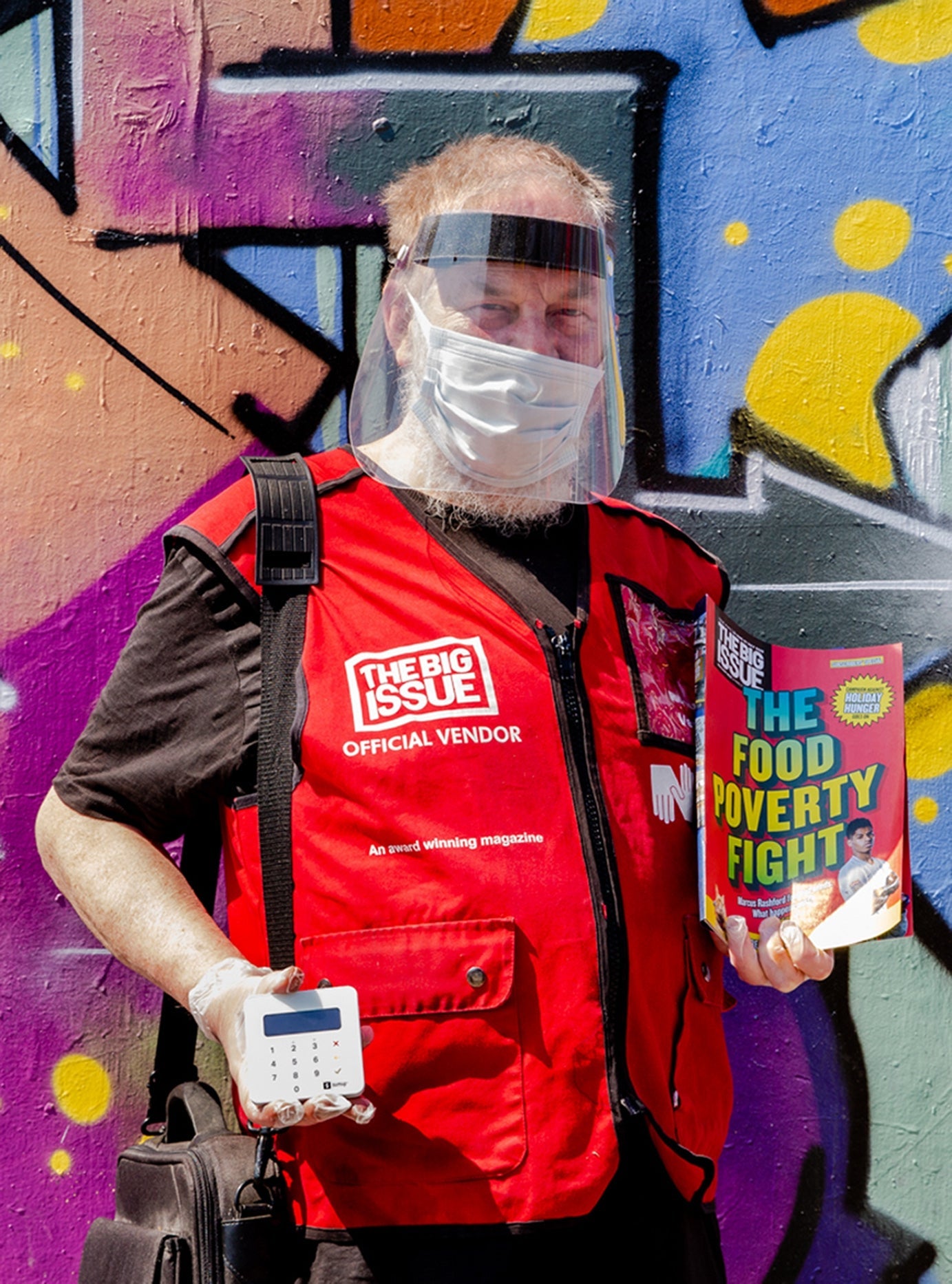 Big Issue Vendor Mike Danks wearing the PPE that he will be using from Monday, when he returns to selling the magazine for the first time since lockdown