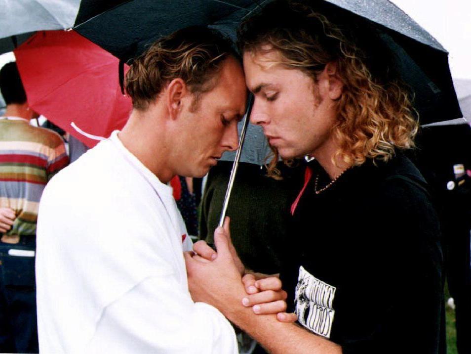 A couple comfort each other in Washington DC in 1992 as the names of people who have died from Aids are read out during a ceremony