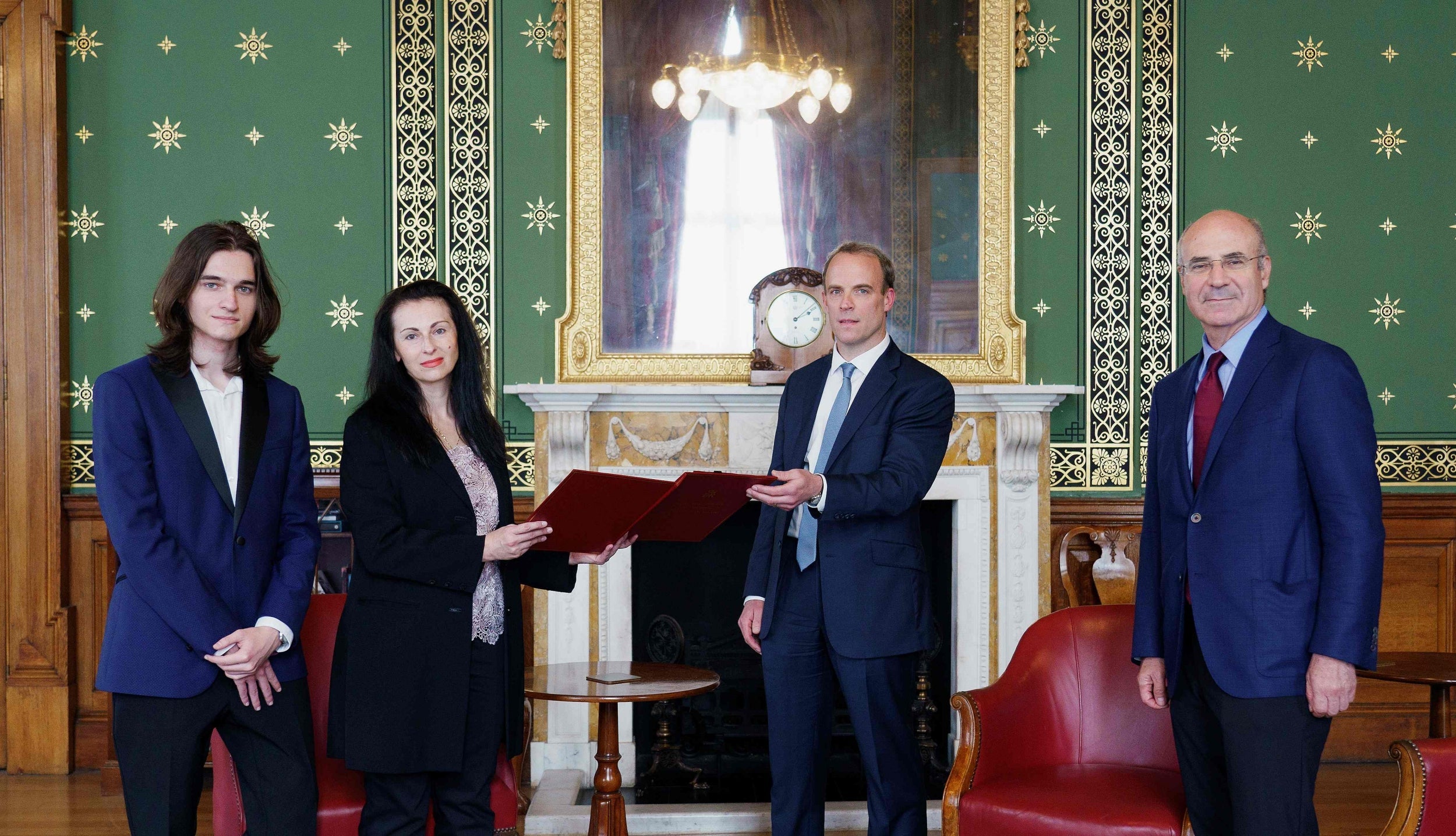 Dominic Raab with Natalya Magnitskaya, Nikita Magnitsky and Bill Browder in the House of Commons