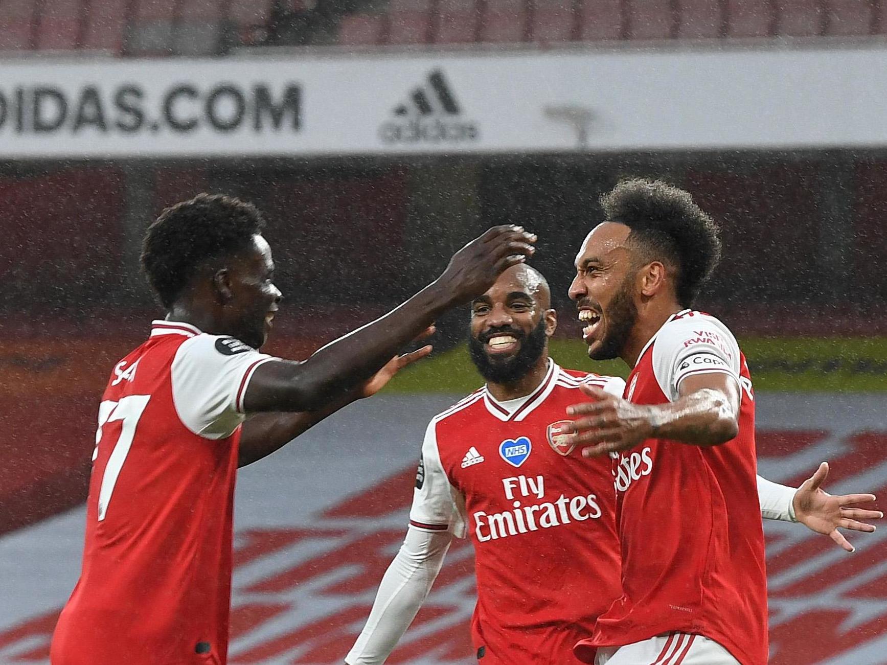 Saka, Lacazette and Aubameyang celebrate