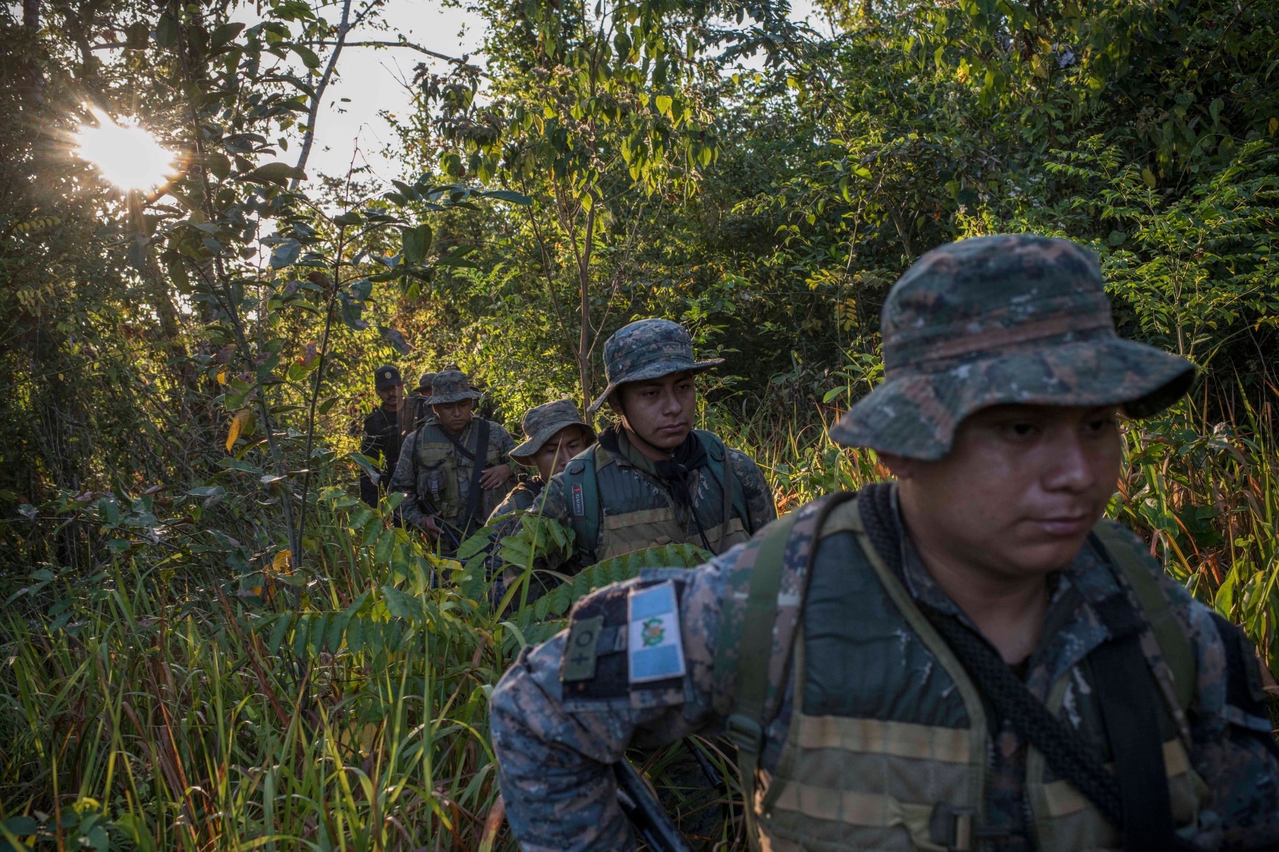 Guatemalan army members patrol Laguna del Tigre National Park in March 2020