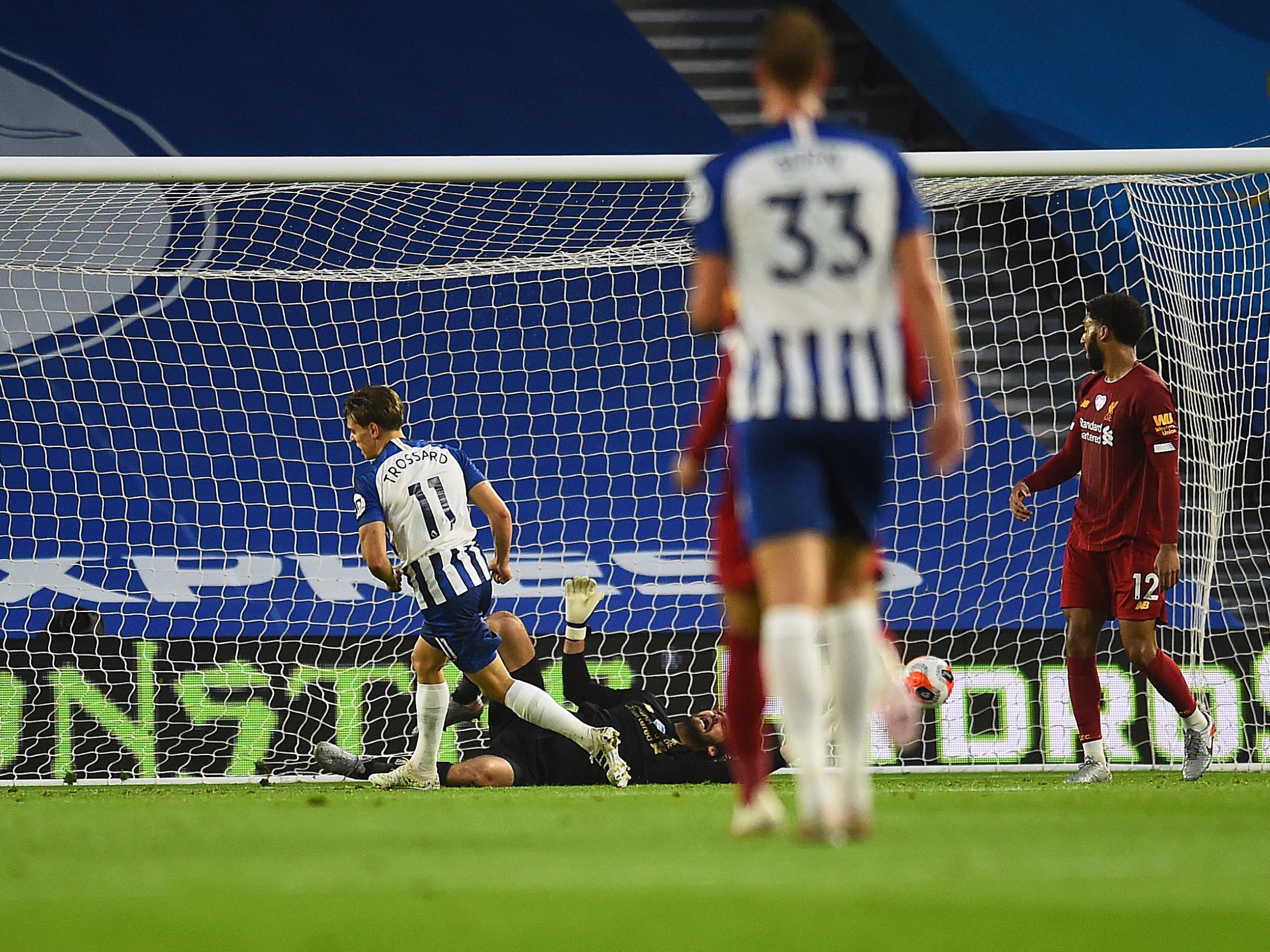 Leandro Trossard wheels away after pulling one back for Brighton