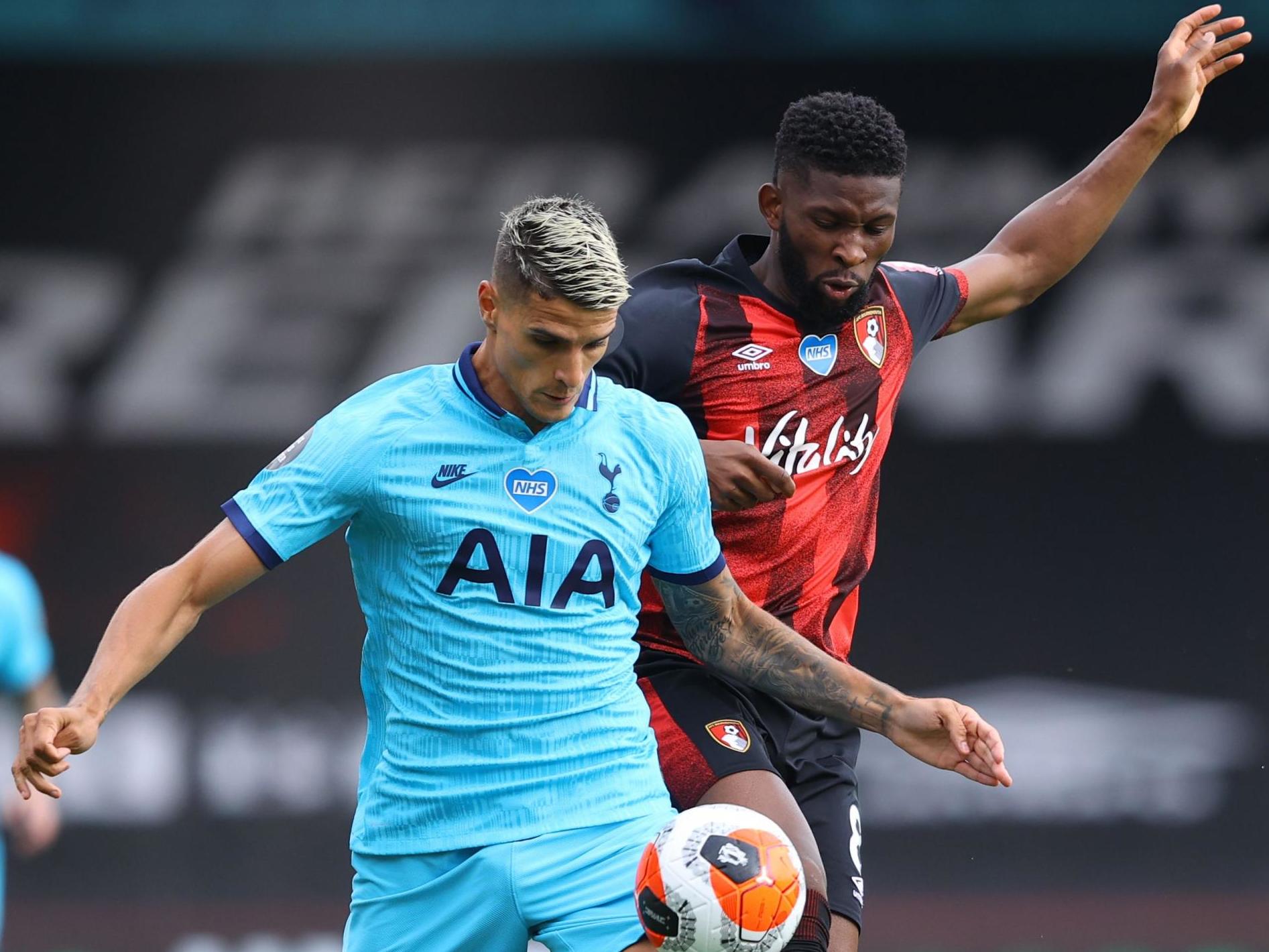 Tottenham Hotspur’s Erik Lamela (L) vies for the ball with Bournemouth’s Jefferson Lerma (AFP via Getty Images)