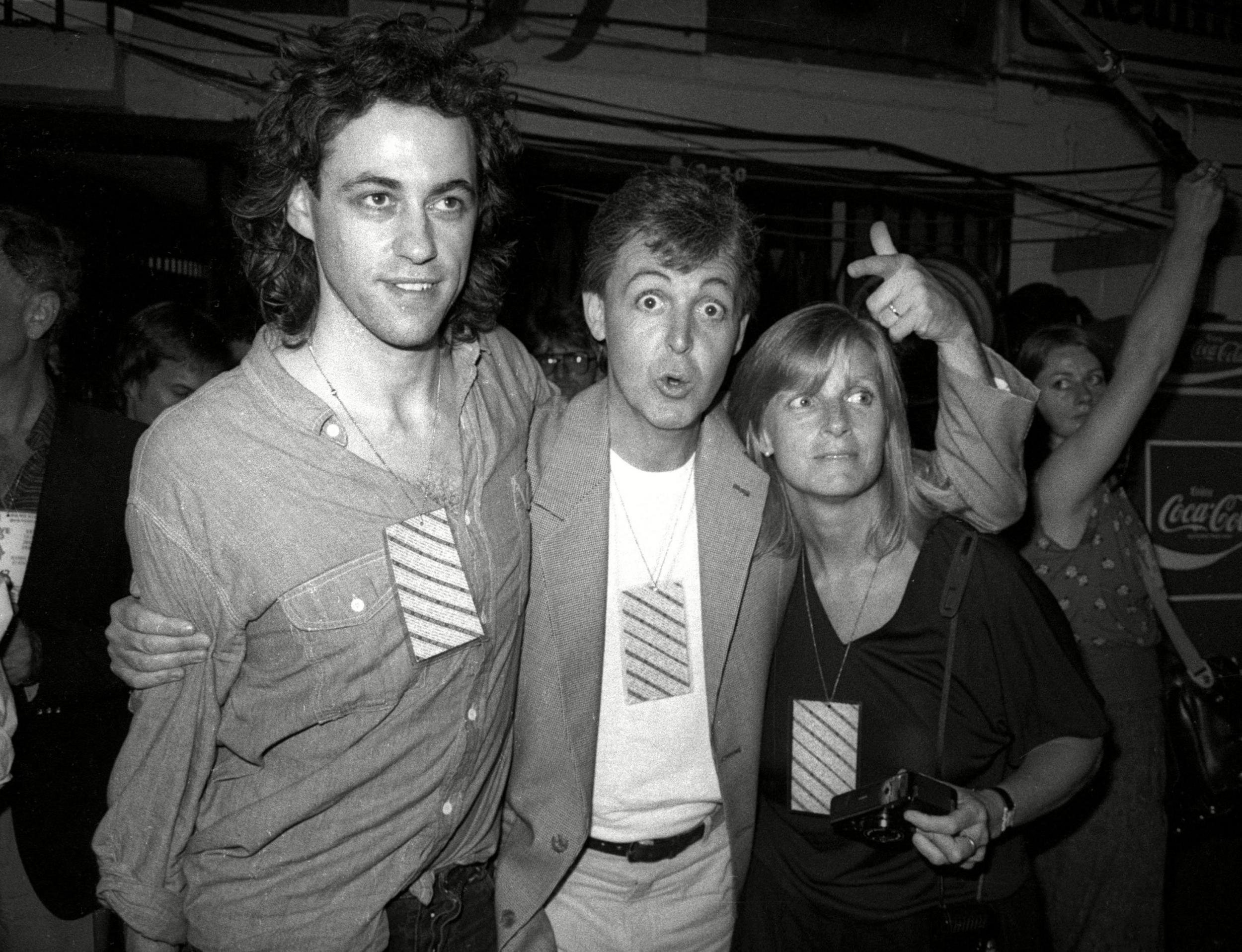 Bob Geldof backstage at Live Aid with Paul and Linda McCartney