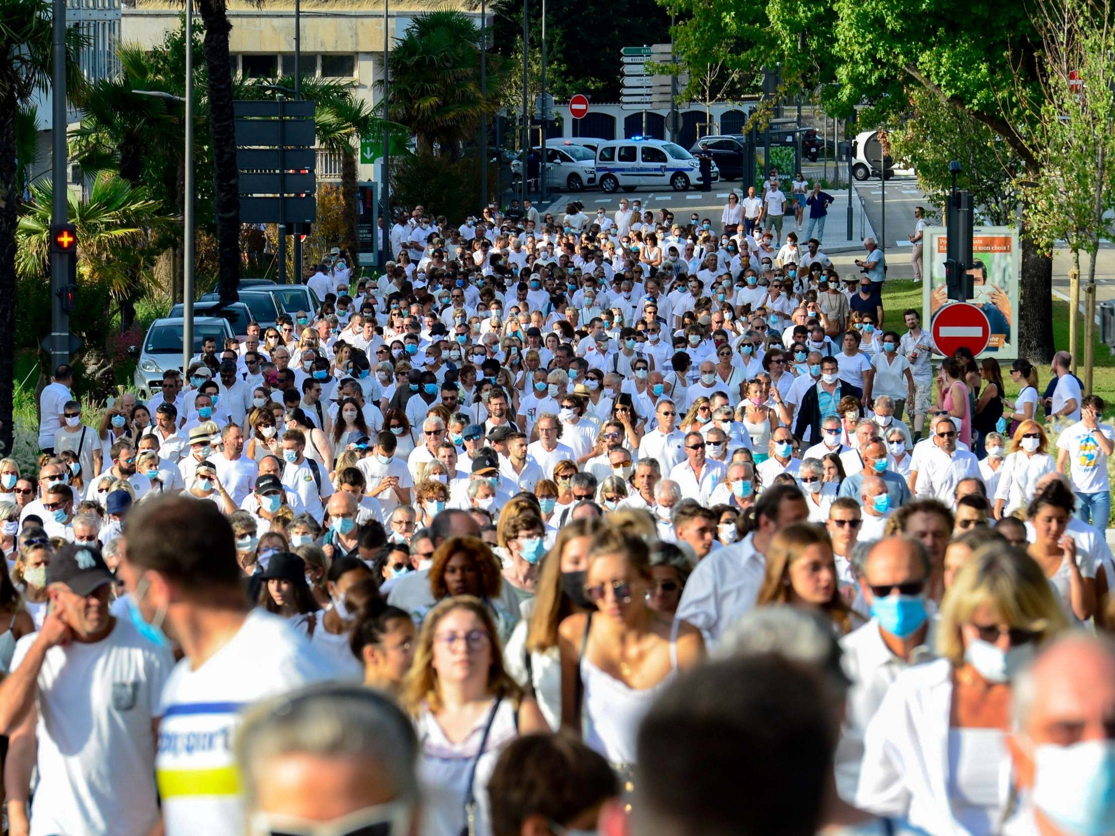 Thousands of people participate in a march as a tribute to French bus driver Philippe Monguillot in Bayonne, southwestern France, 8 July 2020.