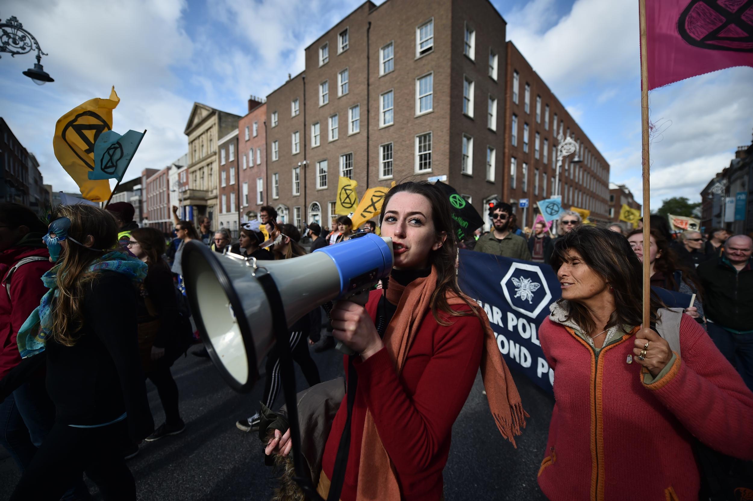 Activists protest outside government buildings in Dublin