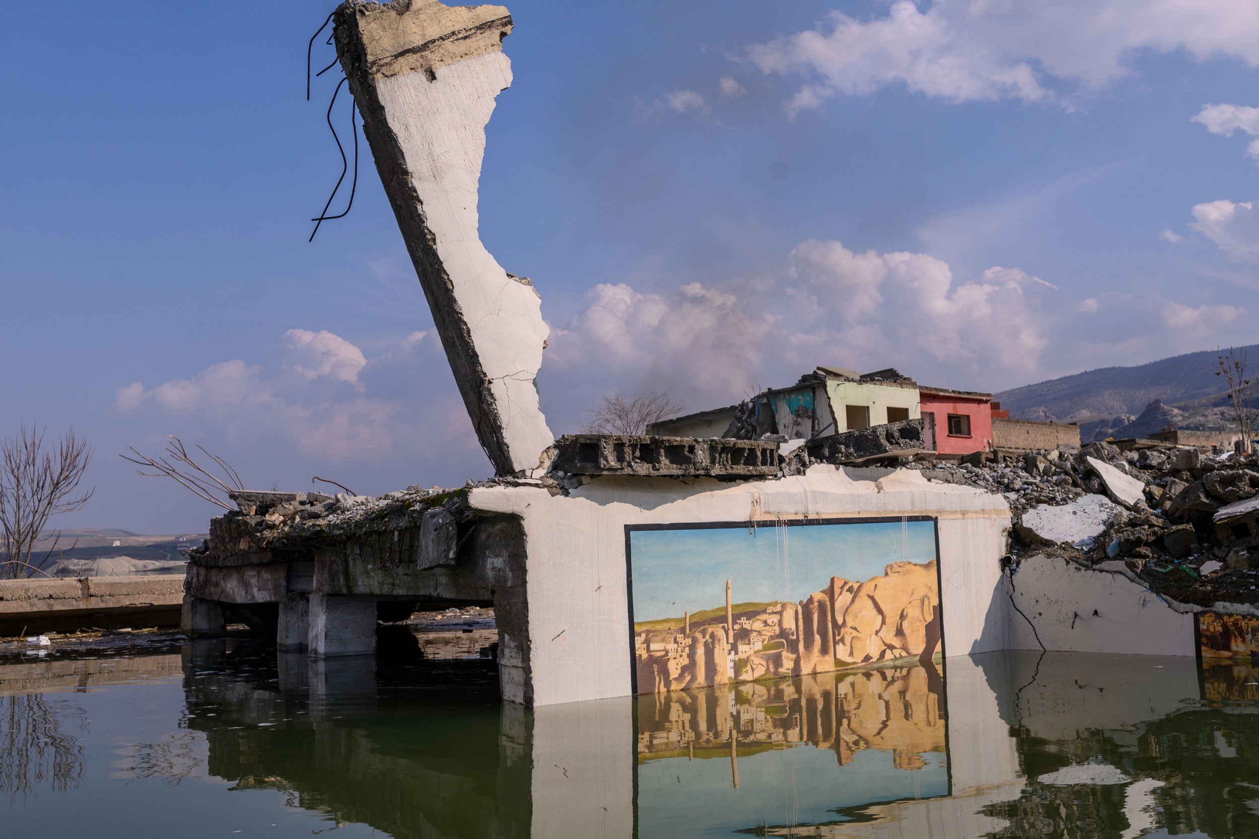 Houses in the ancient city of Hasankeyf destroyed before they were flooded by the dam