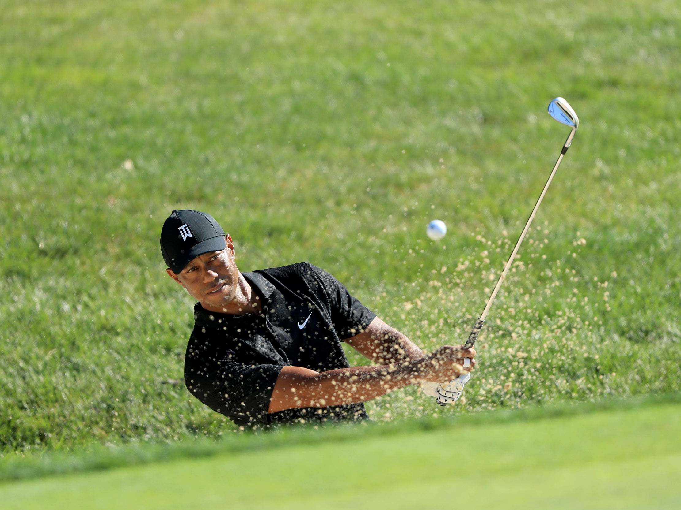 Tiger Woods plays in a practice round at Muirfield Village