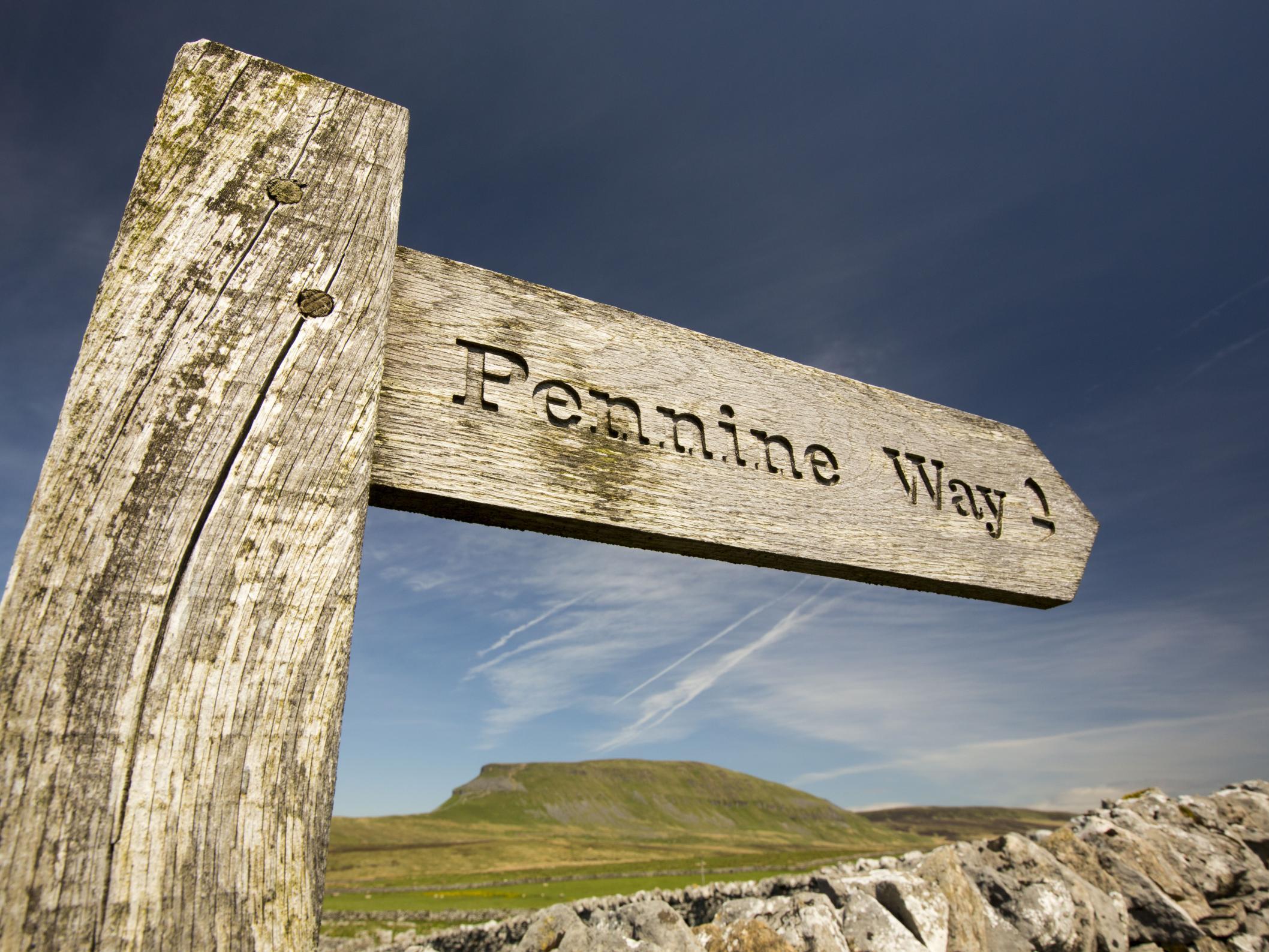 A Pennine Way signpost at Penyghent in the Yorkshire Dales, UK.