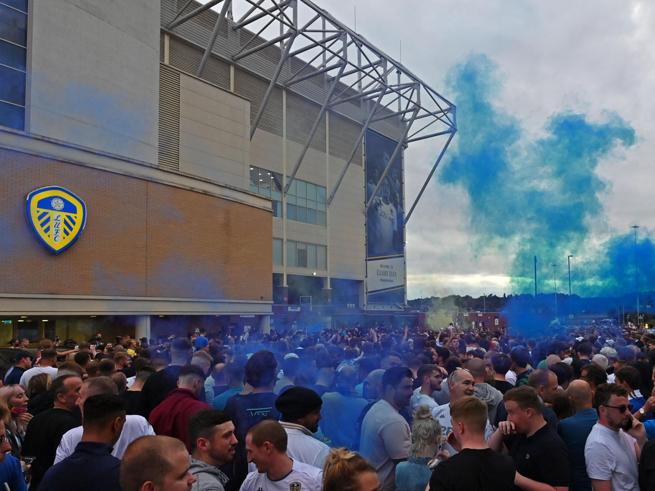 Leeds supporters gather outside Elland Road to celebrate the club’s return to the Premier League