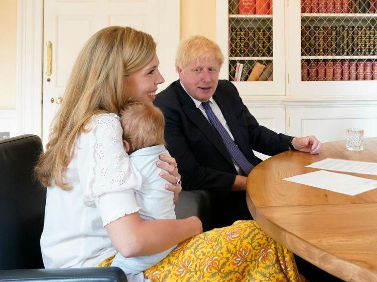 Carrie Symonds and Boris Johnson with their son Wilfred