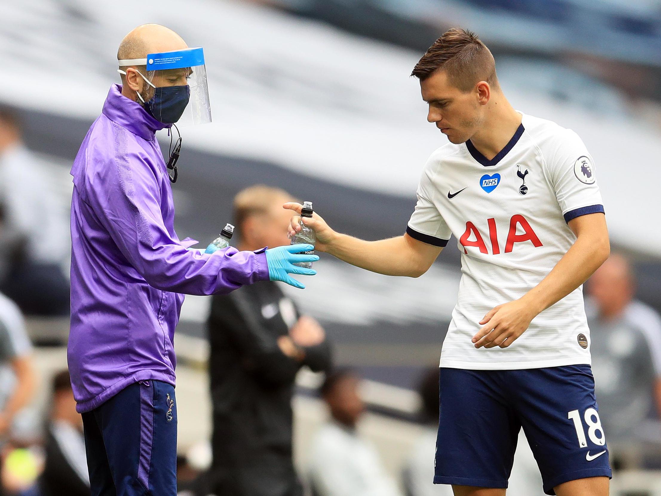 Lo Celso accepts a drink