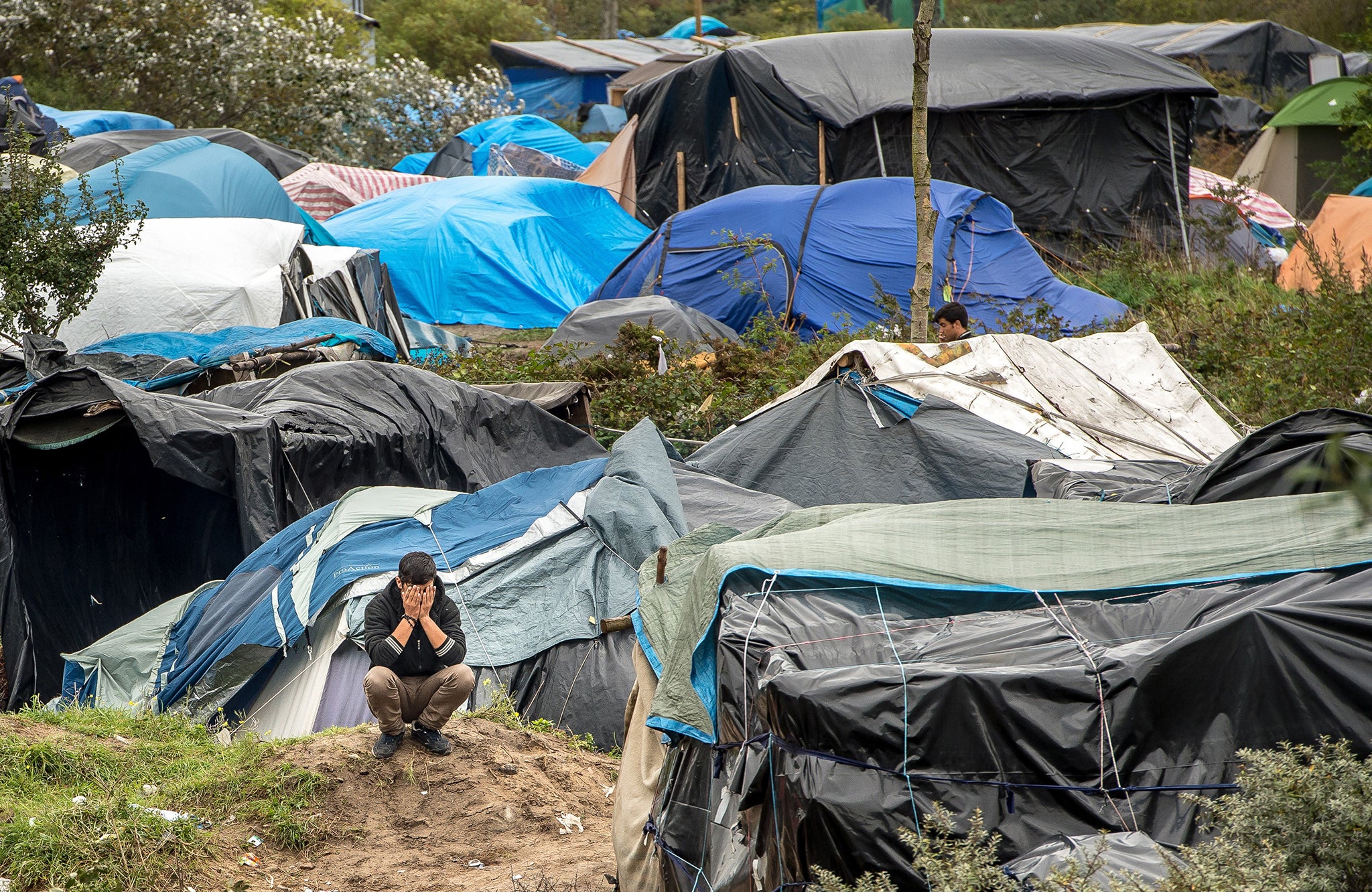 A campsite dubbed the ‘New Jungle’ in Calais is home to some 3,000 people, most of whom are desperately seeking to get to England