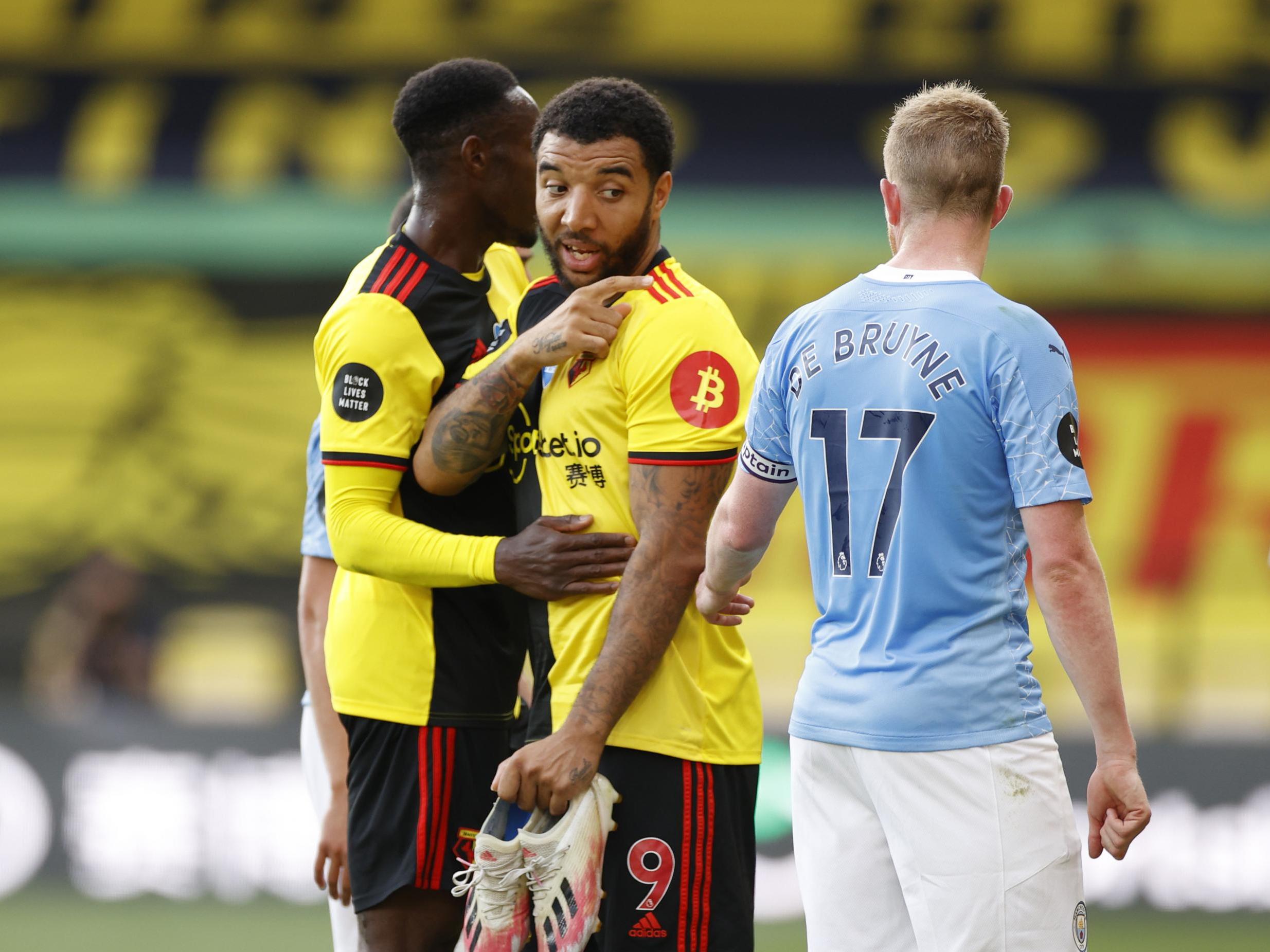 Watford captain Troy Deeney speaks with Man City’s Kevin De Bruyne at full-time