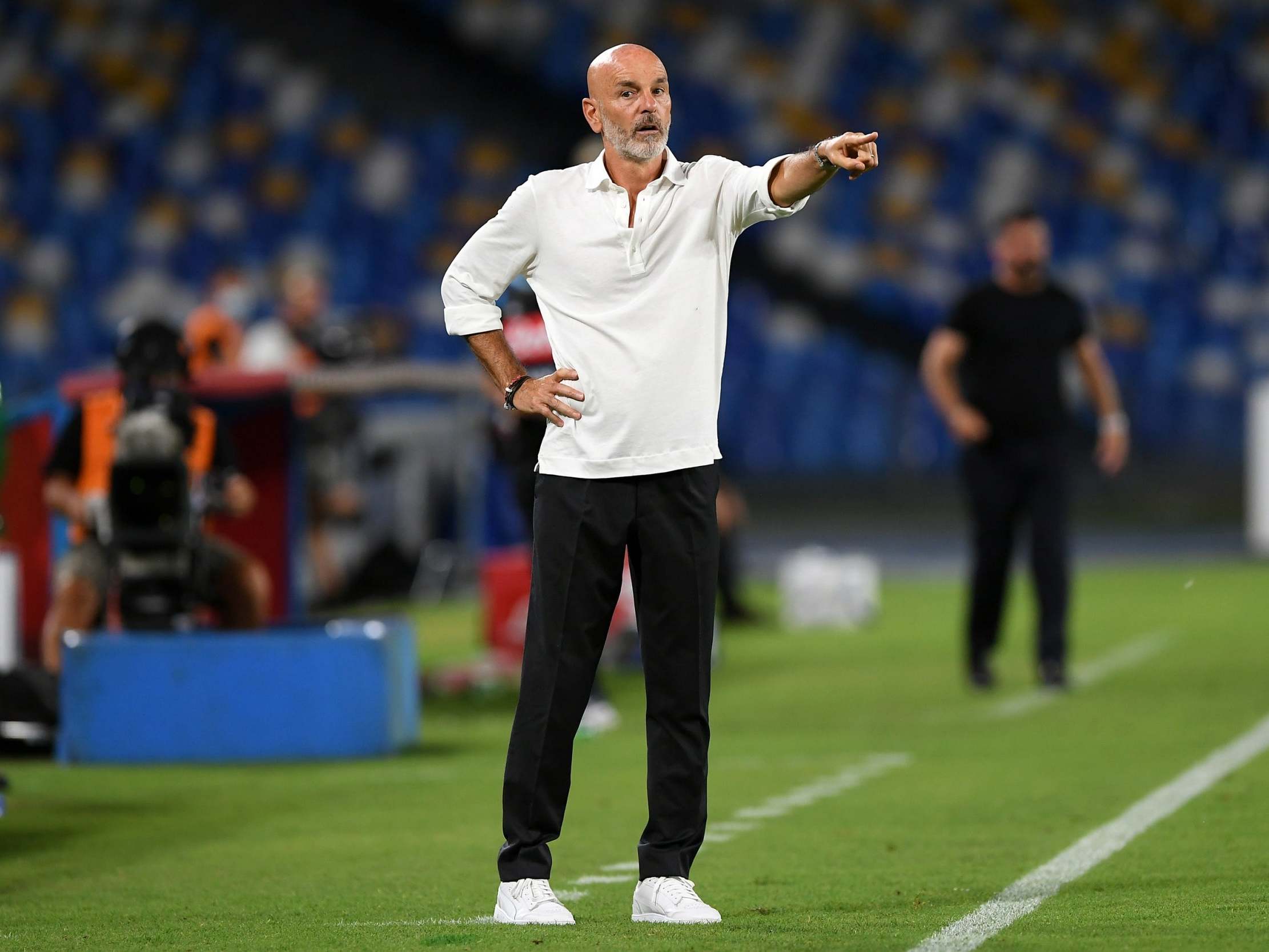 Stefano Pioli directs his Milan side from the touchline