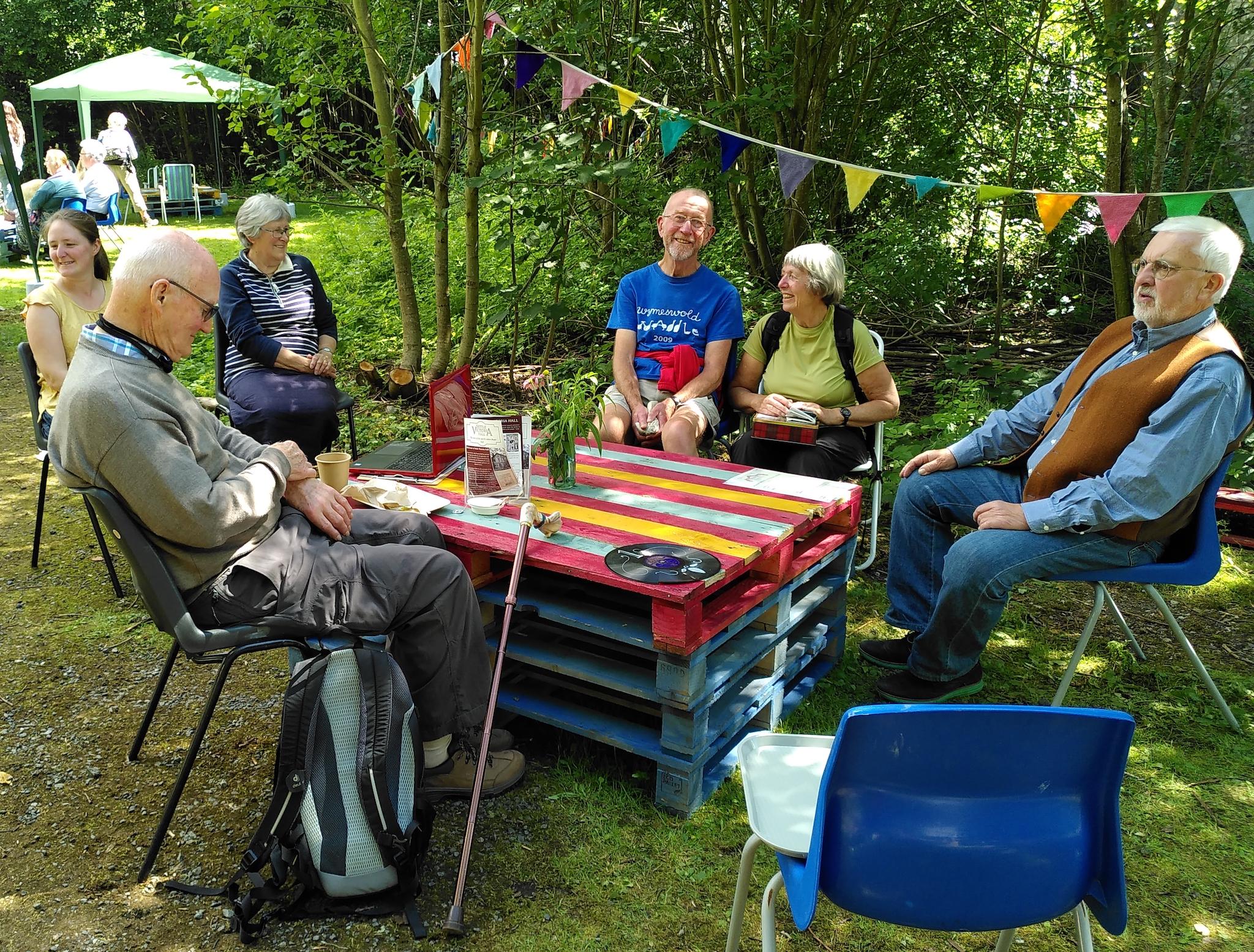 A socially-distanced meet up in the garden of Settle theatre in North Yorkshire, where the community hub is using Twine to track attendance at events