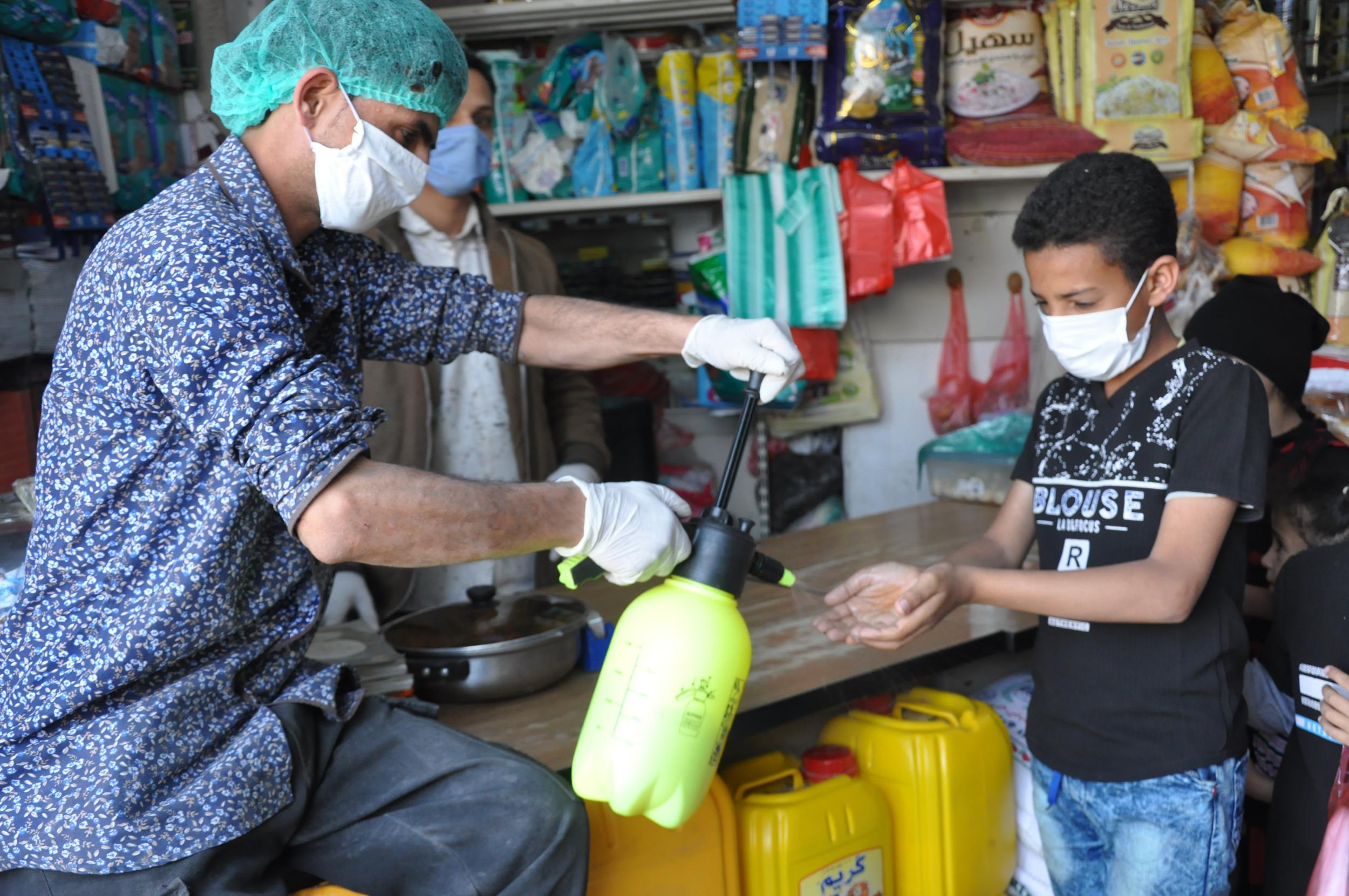 Disinfecting stores in Yemen amid the pandemic