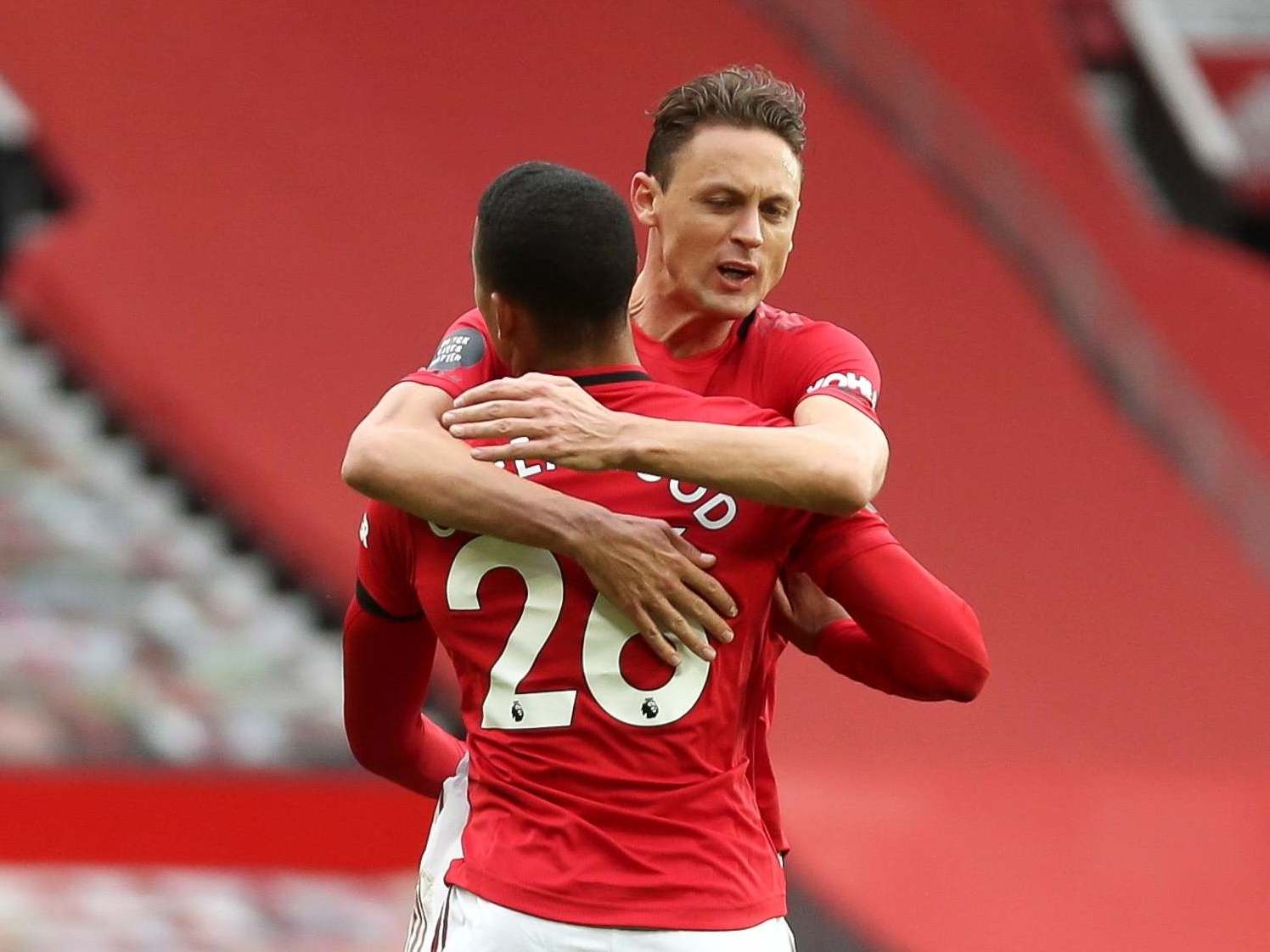 Mason Greenwood celebrates with Nemanja Matic